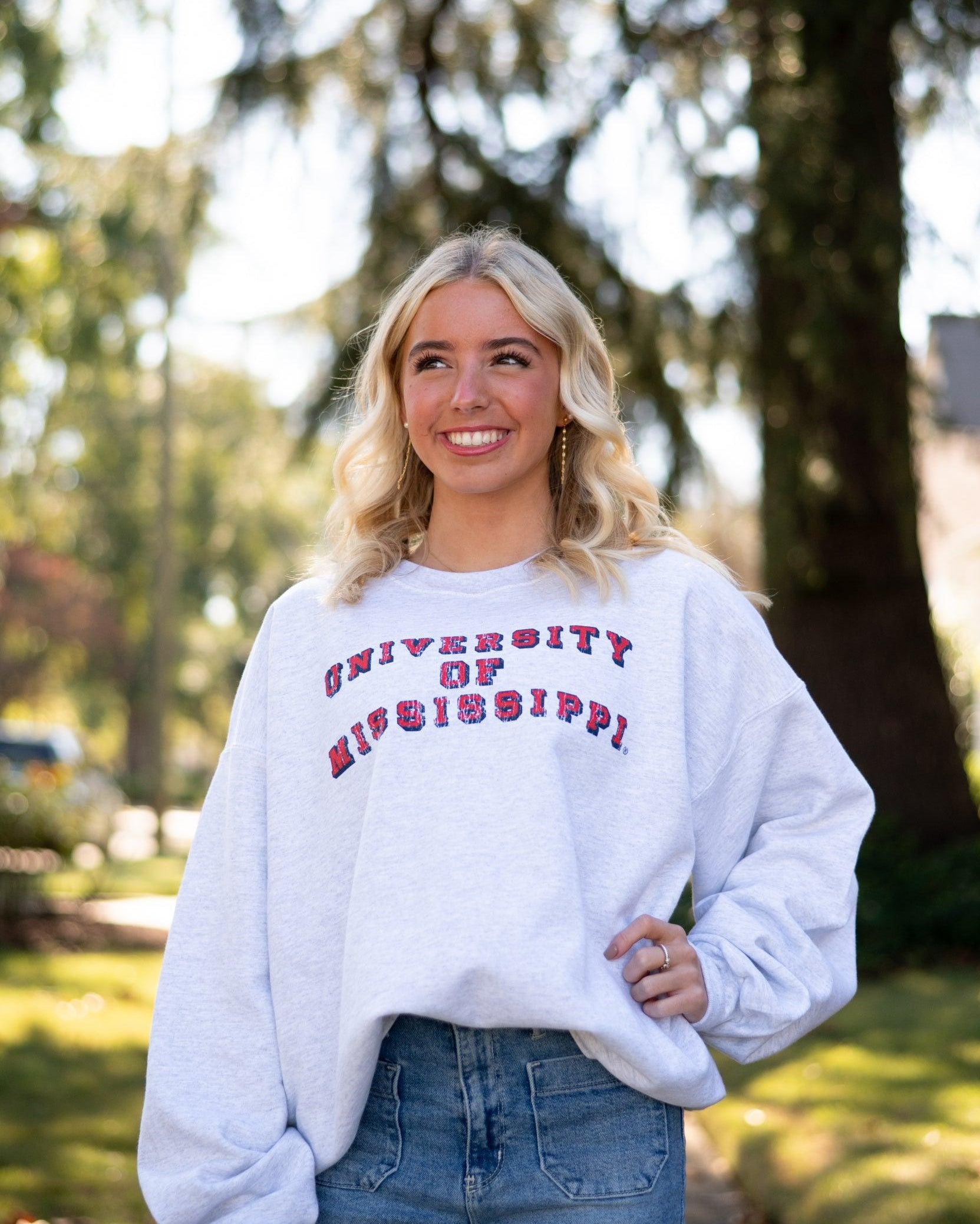 Ole Miss Light Grey Sweatshirt with Red text “University of Mississippi”
