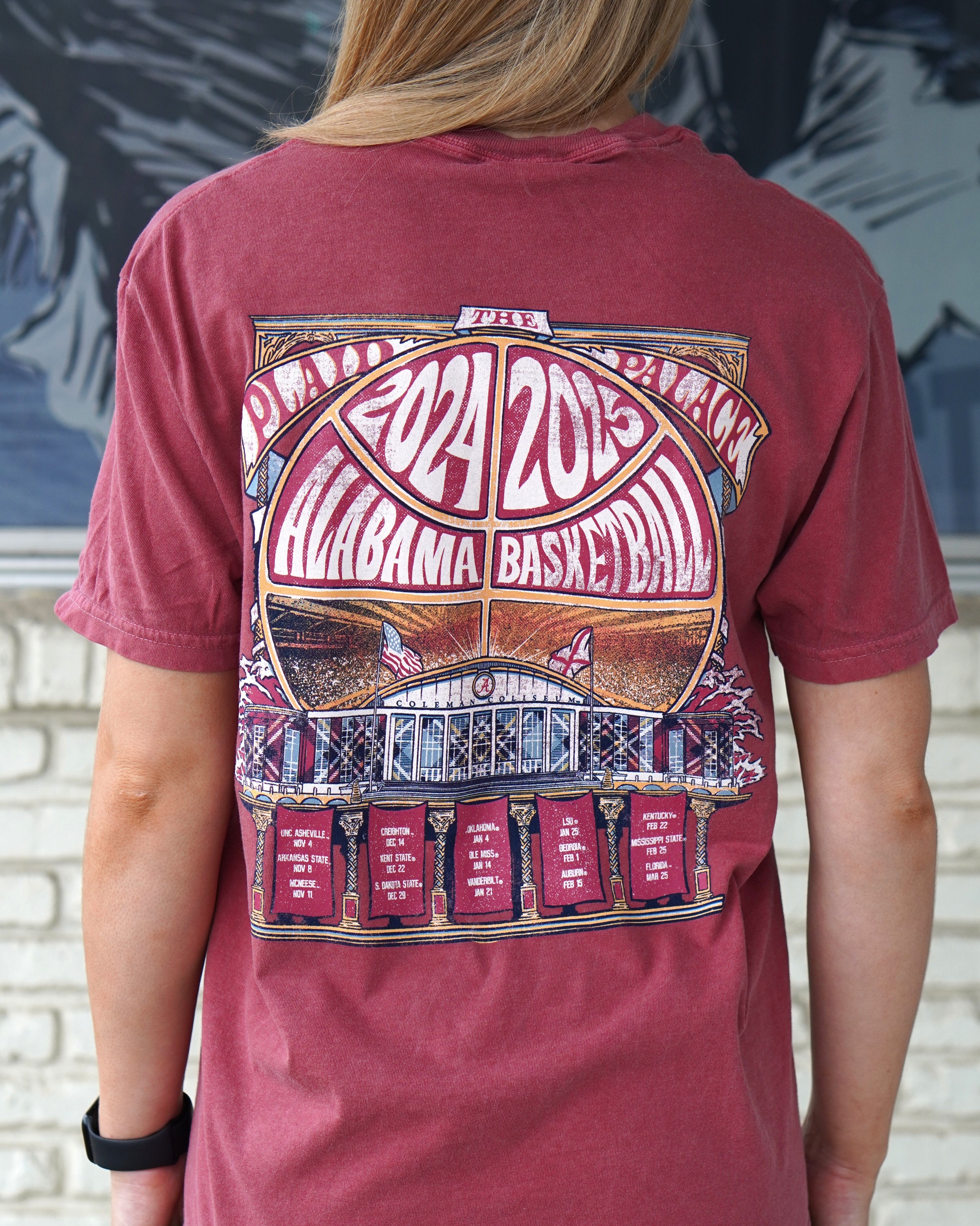 University of Alabama Red Coleman Coliseum T-Shirt with a graphic of a basketball outline with white text "2024 2025 Alabama Basketball" behind Coleman Coliseum