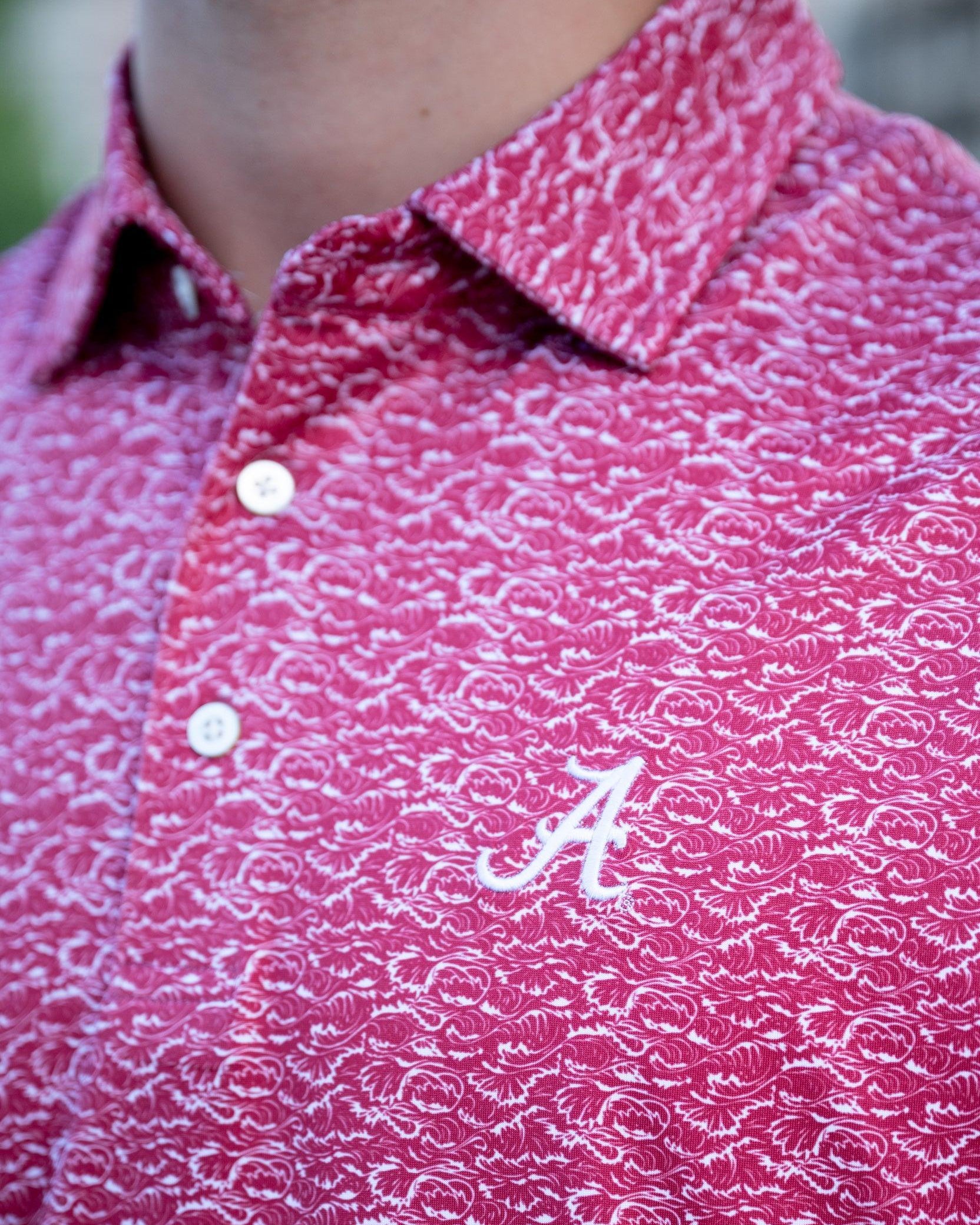 University of Alabama Red Men's Performance Polo with a White wave pattern and White Script A embroidery
