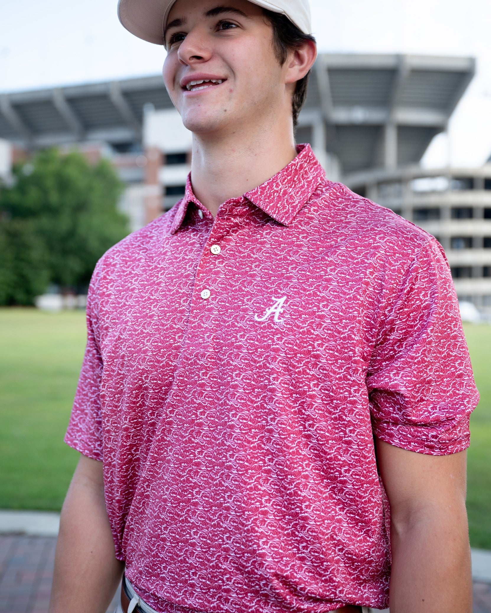 University of Alabama Red Men's Performance Polo with a White wave pattern and White Script A embroidery