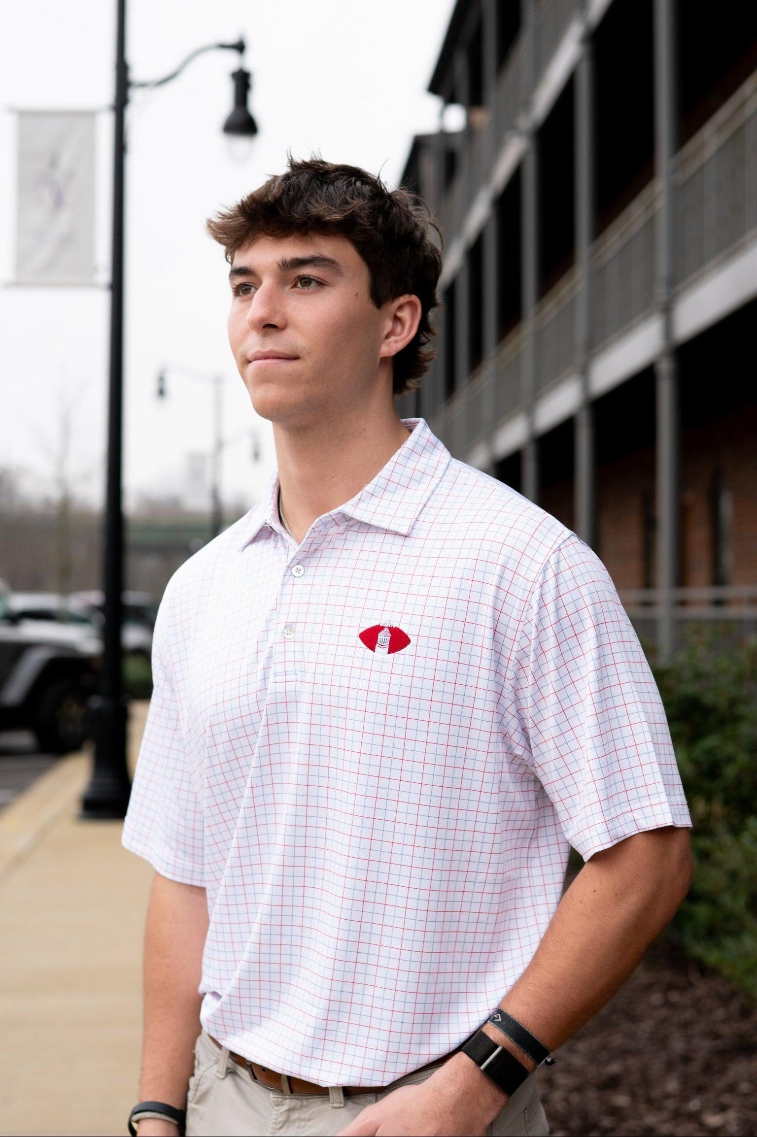 University of Alabama Red/Blue/White patterned Men’s Polo with Denney Chimes in a football embroidered on the chest