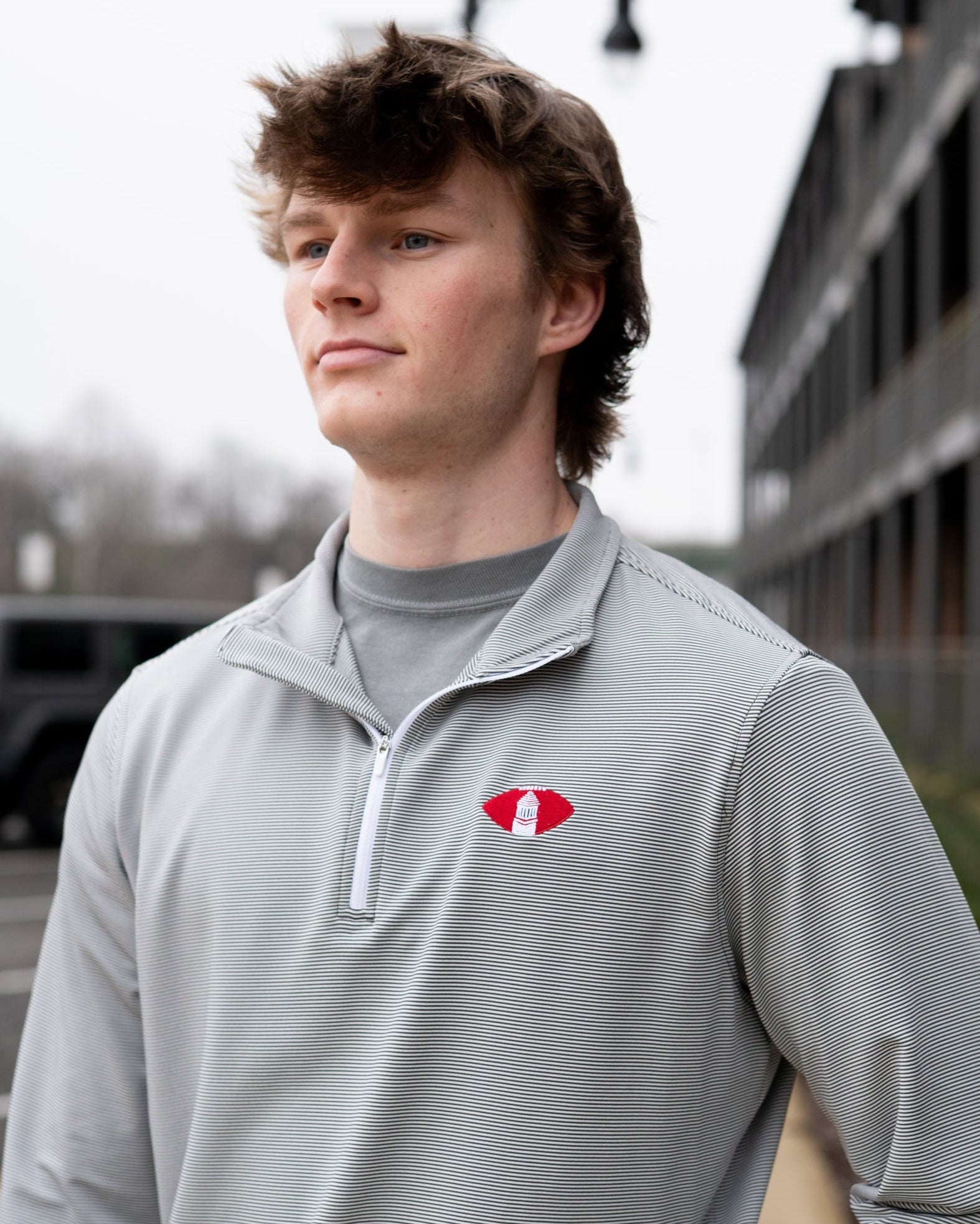 University of Alabama Grey Striped Men’s ¼ Zip Pullover with Denney Chimes in a football embroidered on the chest