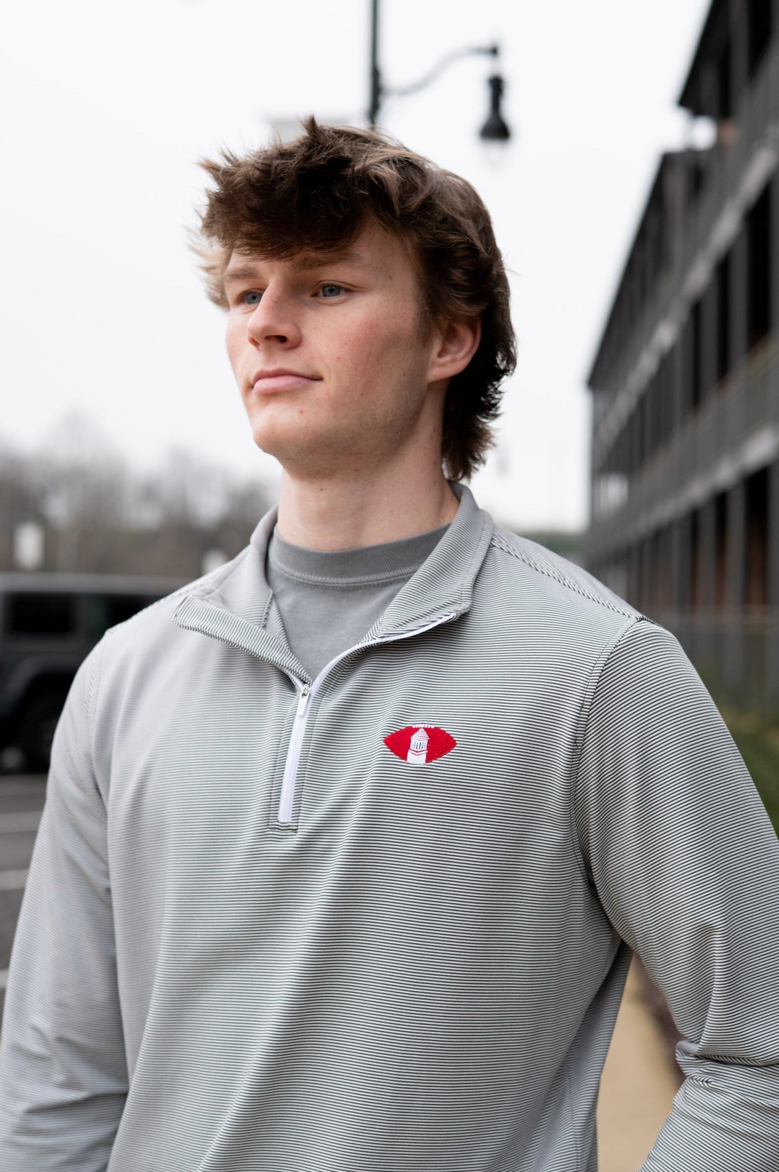 University of Alabama Grey Striped Men’s ¼ Zip Pullover with Denney Chimes in a football embroidered on the chest