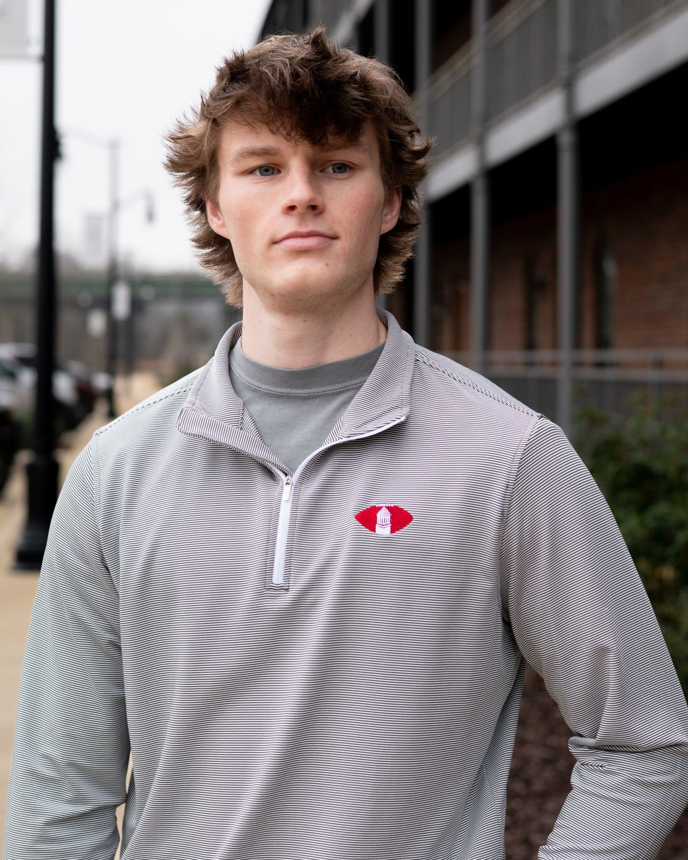University of Alabama Grey Striped Men’s ¼ Zip Pullover with Denney Chimes in a football embroidered on the chest