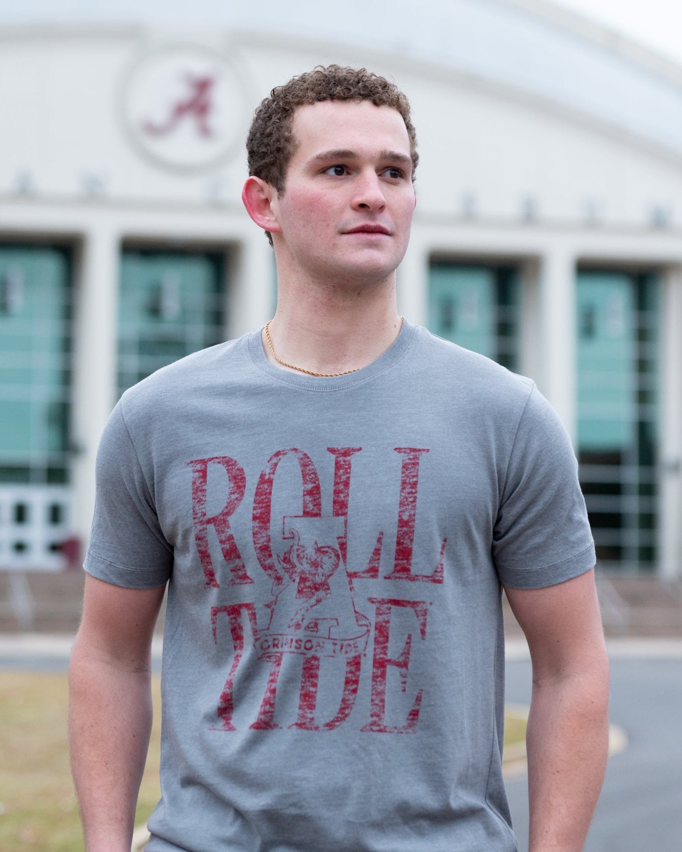University of Alabama Grey T-Shirt with a distressed print of the Vintage A logo in front of Red text “Roll Tide”