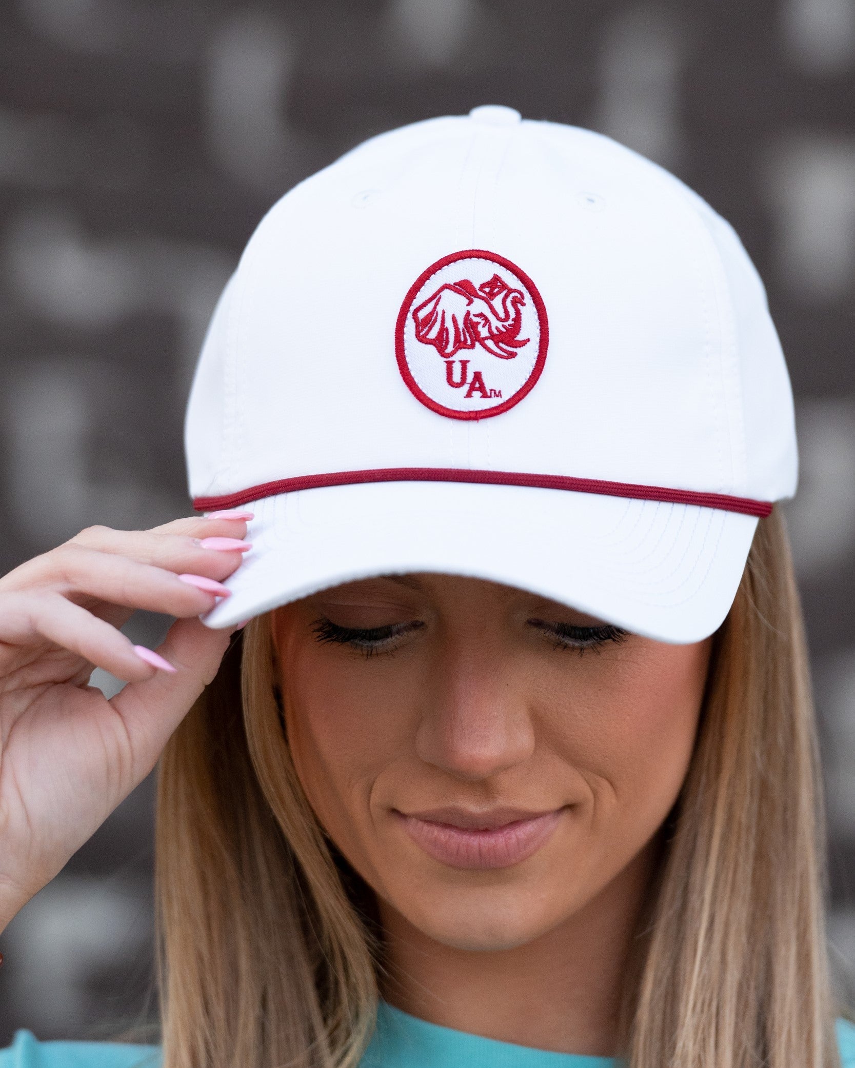 University of Alabama White Rope Hat with a Red Rope and an image of an elephant holding an Alabama State flag above the letters "UA"
