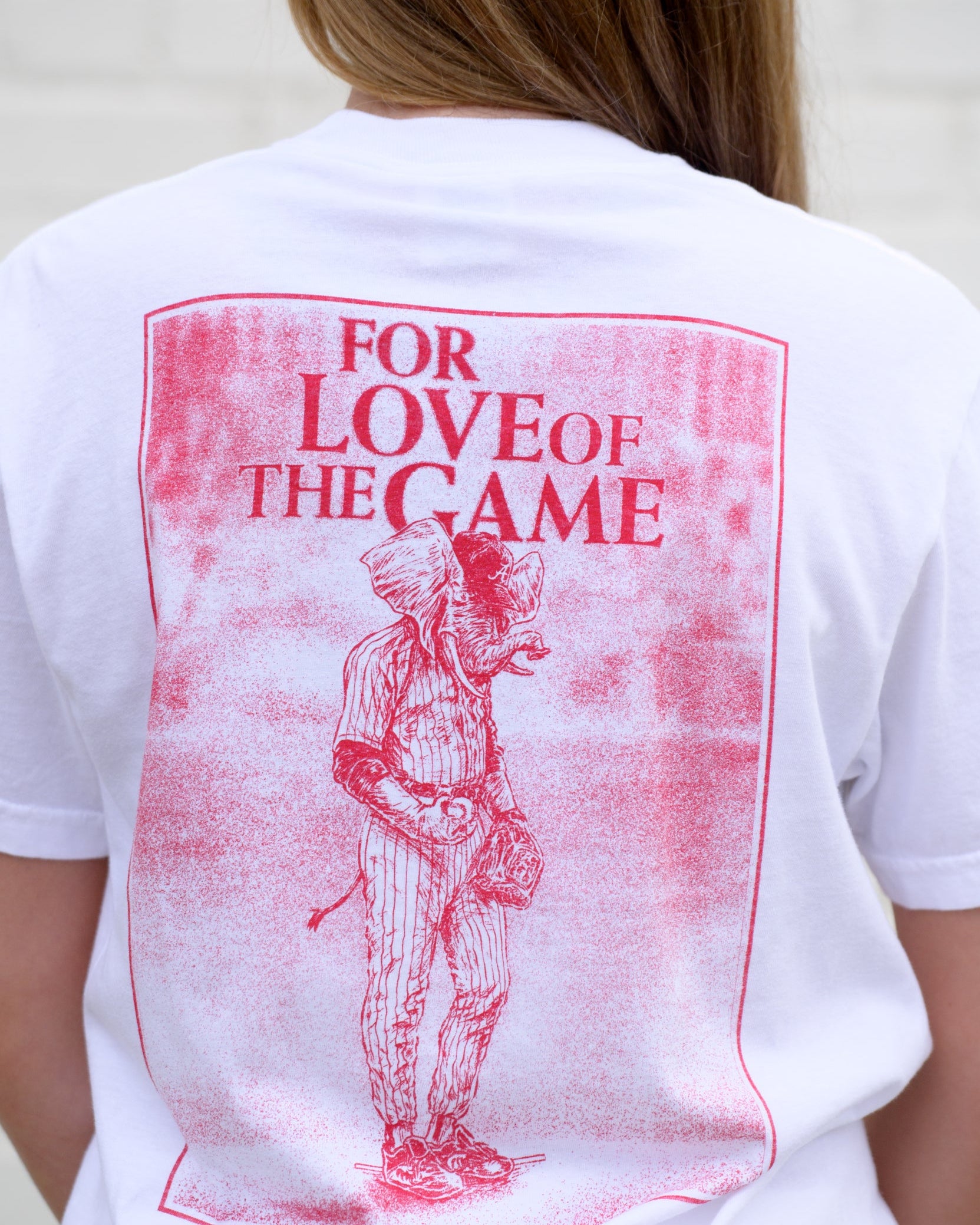 University of Alabama White T-Shirt with a Red illustration of Big Al in baseball gear below Red text "For The Love of The Game