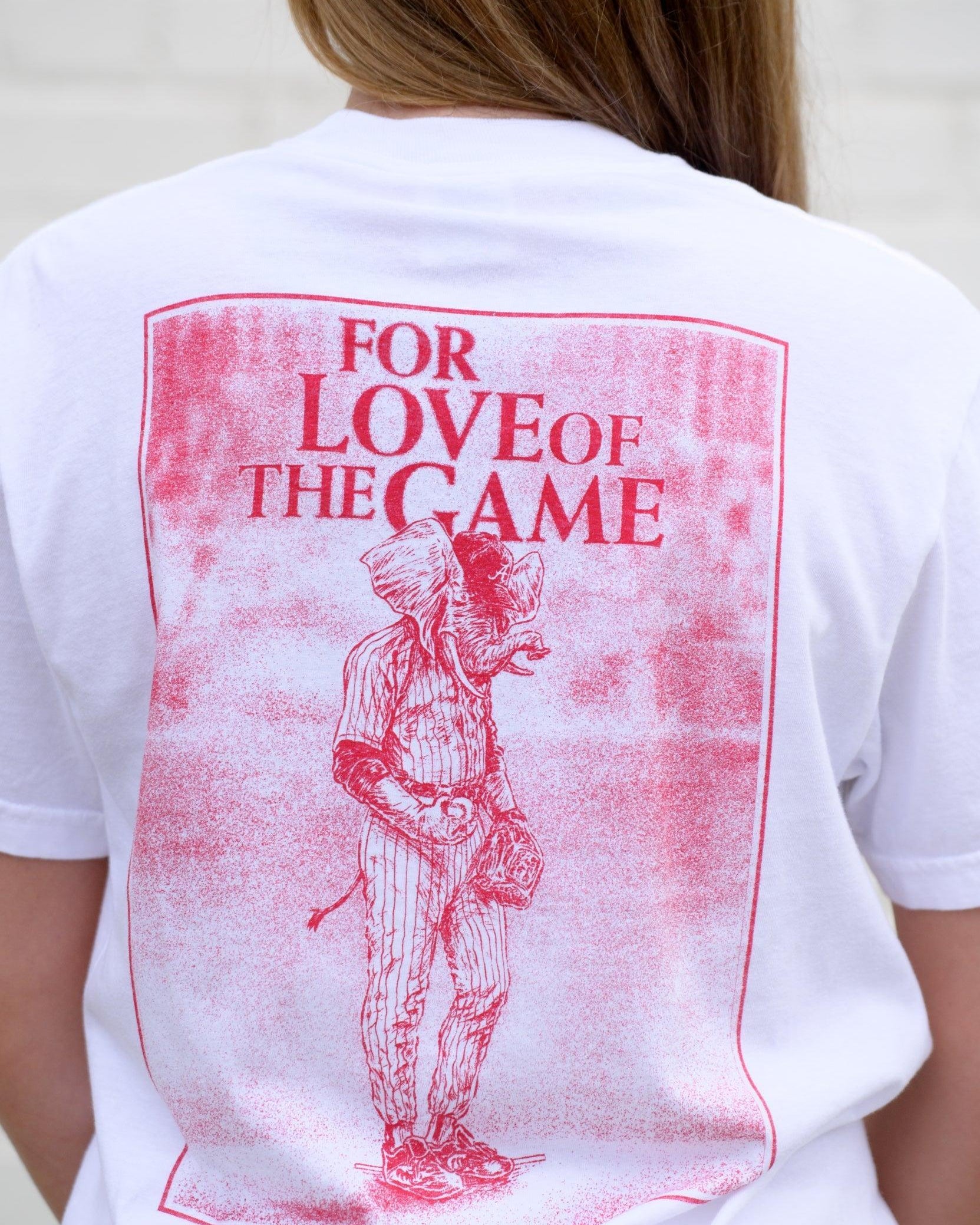 University of Alabama White T-Shirt with a Red illustration of Big Al in baseball gear below Red text "For The Love of The Game