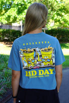Gallettes Blue Bid Day T-Shirt with two yellow cups wearing sunglasses sitting at a bar and pouring themselves drinks above Yellow text "Bid Day August 18th, 2024"