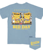 Gallettes Blue Bid Day T-Shirt with two yellow cups wearing sunglasses sitting at a bar and pouring themselves drinks above Yellow text "Bid Day August 18th, 2024"