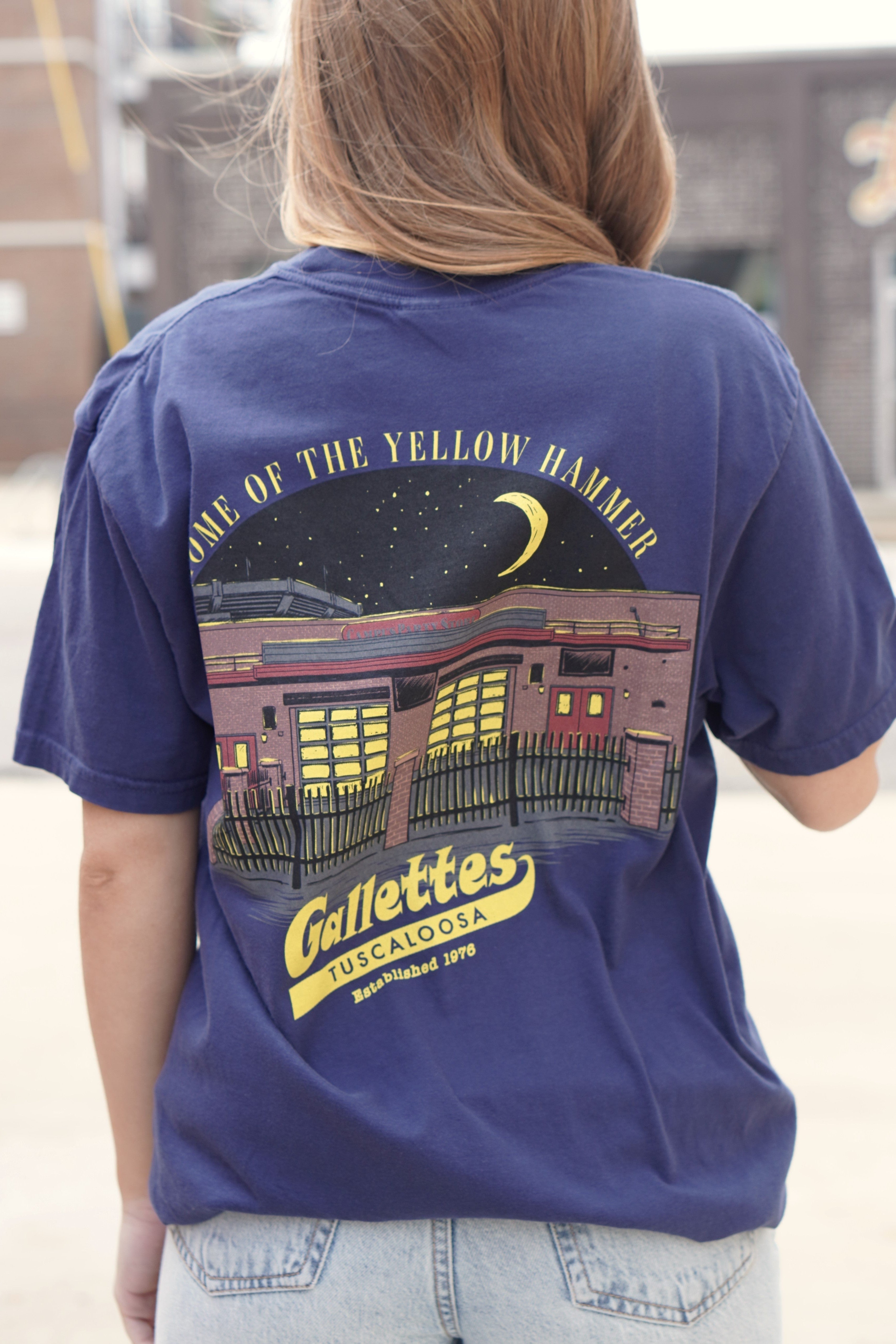 Gallettes Navy Building Tee with Yellow text "Home of the Yellow Hammer" above an illustration of the Gallettes Building