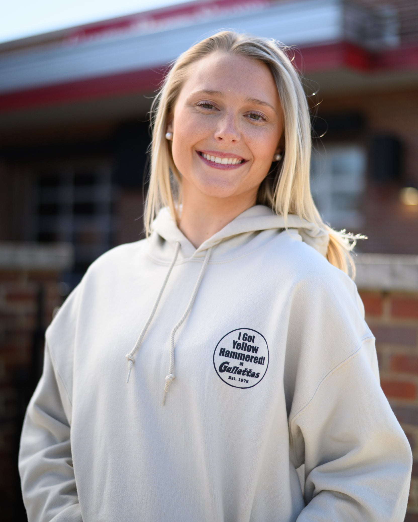 Gallettes Tan Hoodie with an “I Got Yellow Hammered at Gallettes” left chest design