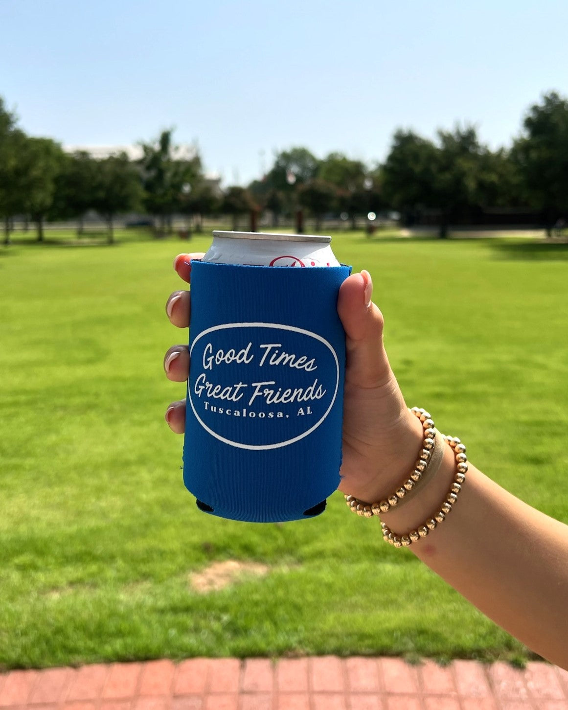 Good Times Tuscaloosa Blue Koozie with White text "Good Times Great Friends"