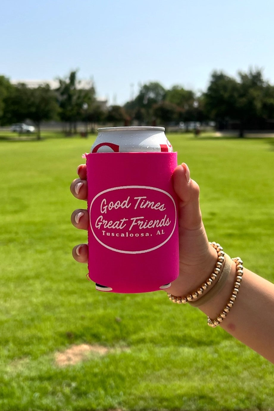 Good Times Tuscaloosa Pink Koozie with White text "Good Times Great Friends"