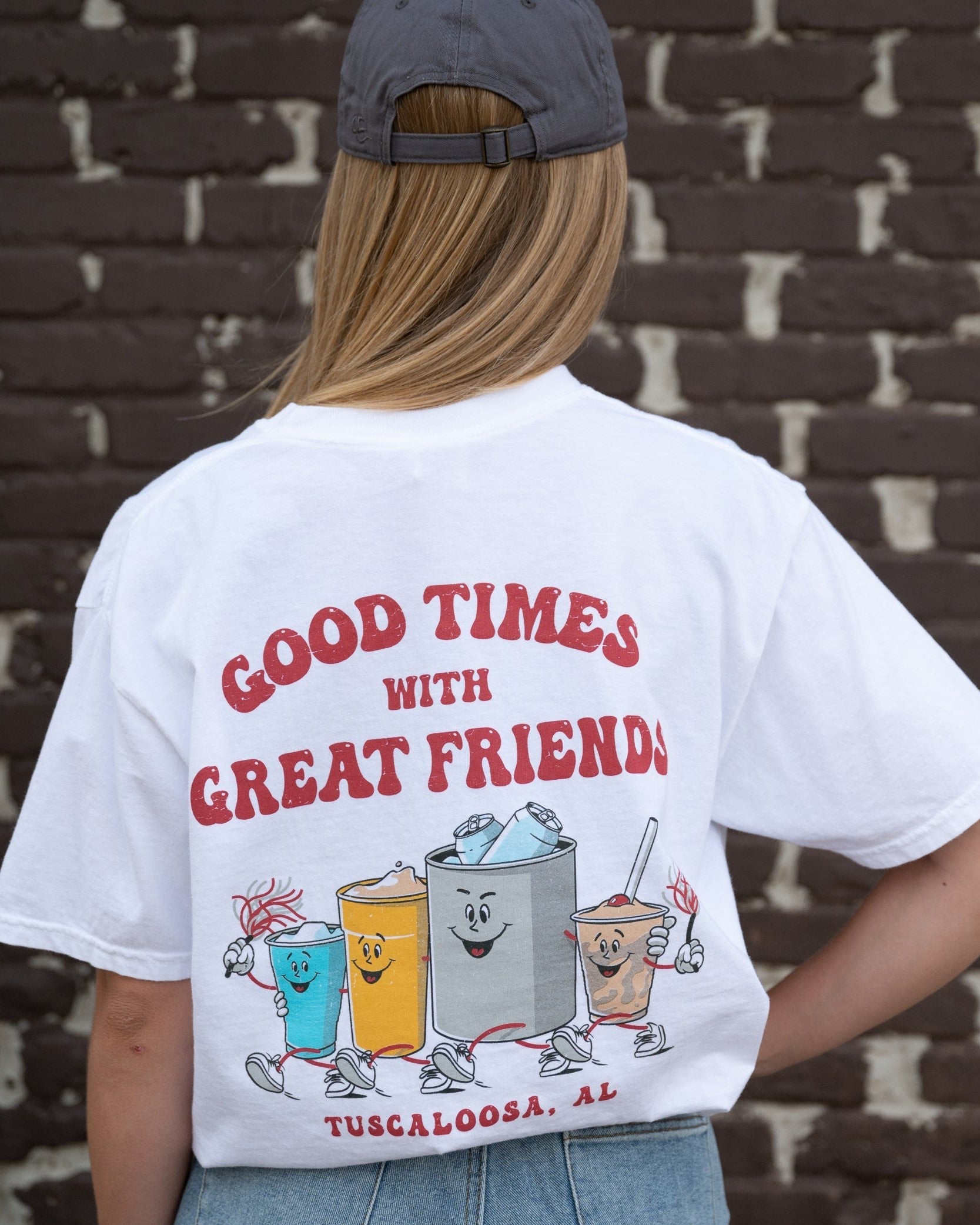 Good Times Tuscaloosa White T-Shirt with Red text "Good Times with Great Friends" above drinks walking together and holding shakers