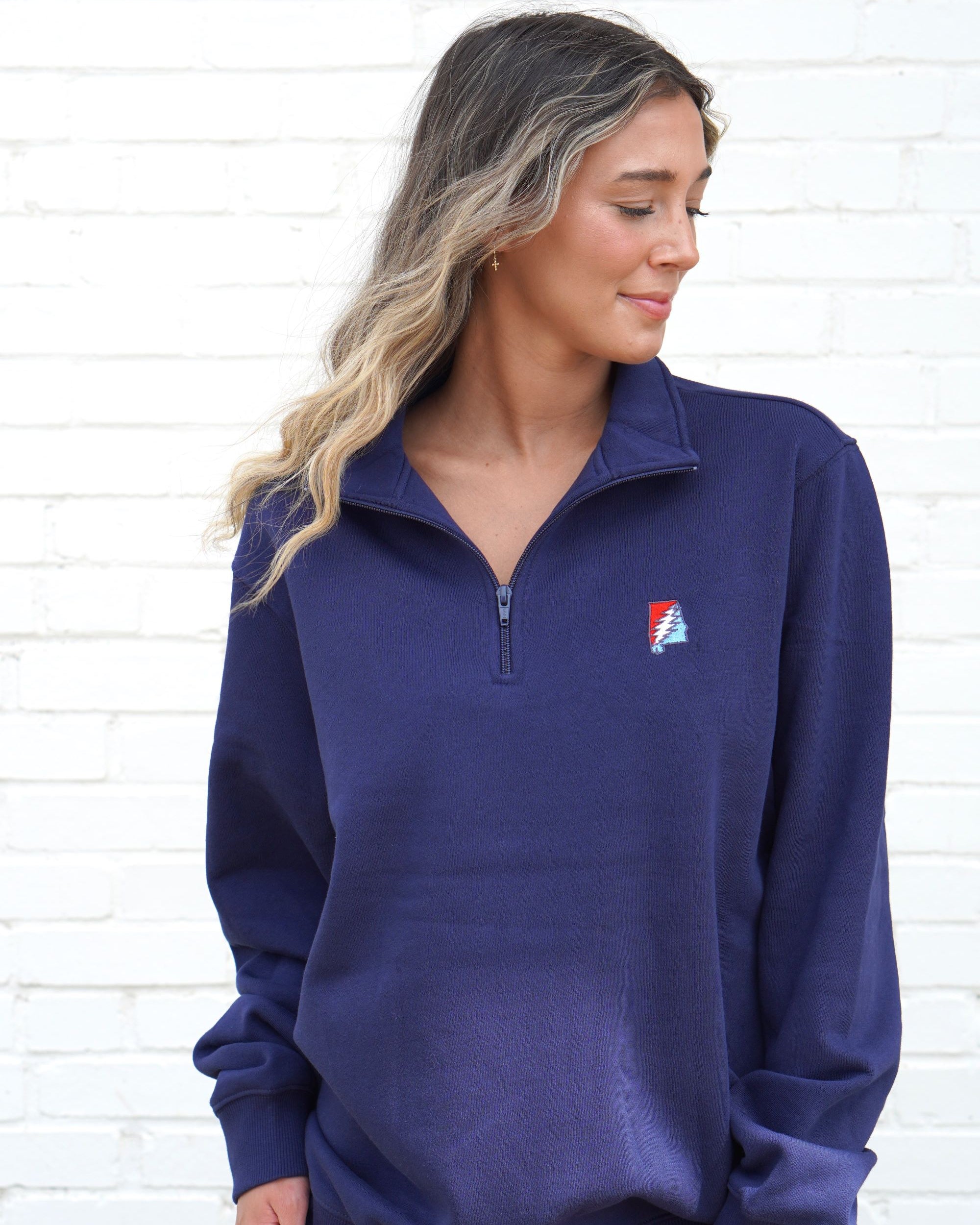 Grateful State Navy Sport Tek ¼ Zip with a Red and Blue embroidery of the Alabama "Grateful State" Logo