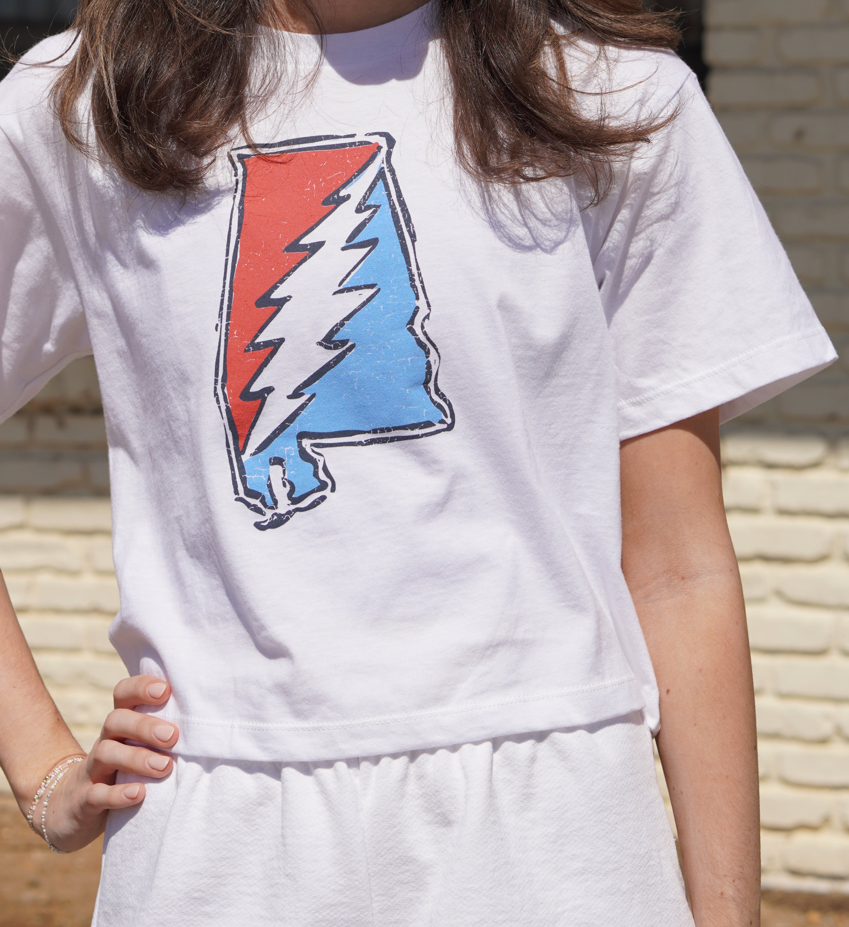 Grateful State White Ladies T-Shirt with Red and Blue print of the Alabama "Grateful State" Logo