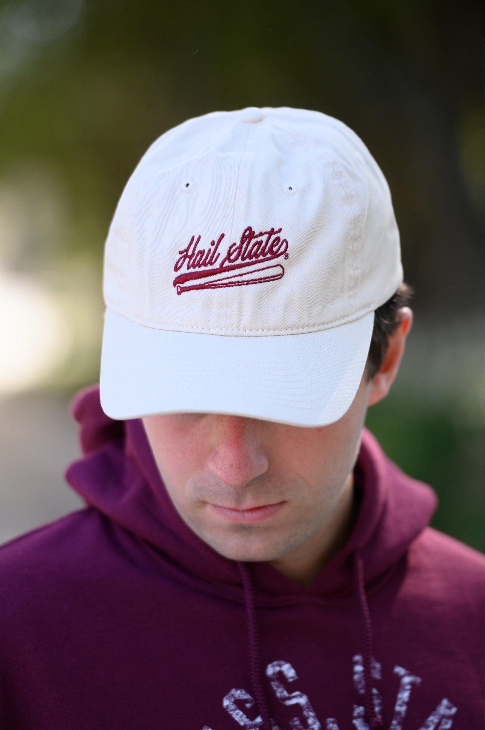 Mississippi State Light Tan Dad Hat with Maroon “Hail State” script and baseball bat embroidery