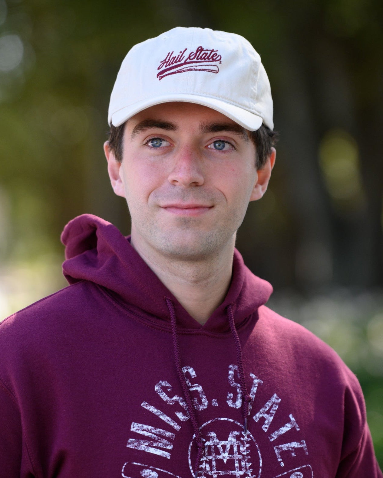 Mississippi State Light Tan Dad Hat with Maroon “Hail State” script and baseball bat embroidery