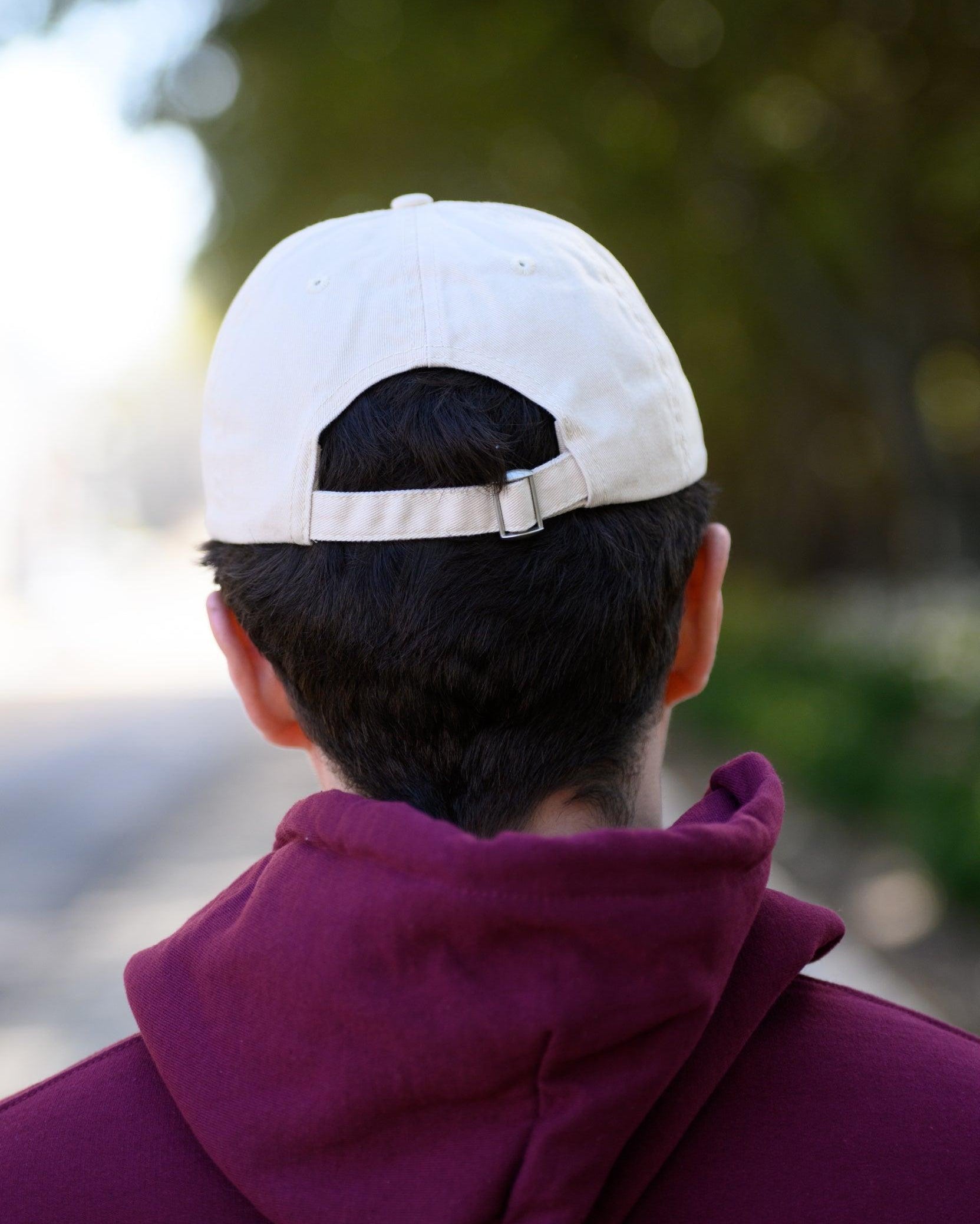 Mississippi State Light Tan Dad Hat with Maroon “Hail State” script and baseball bat embroidery
strap back