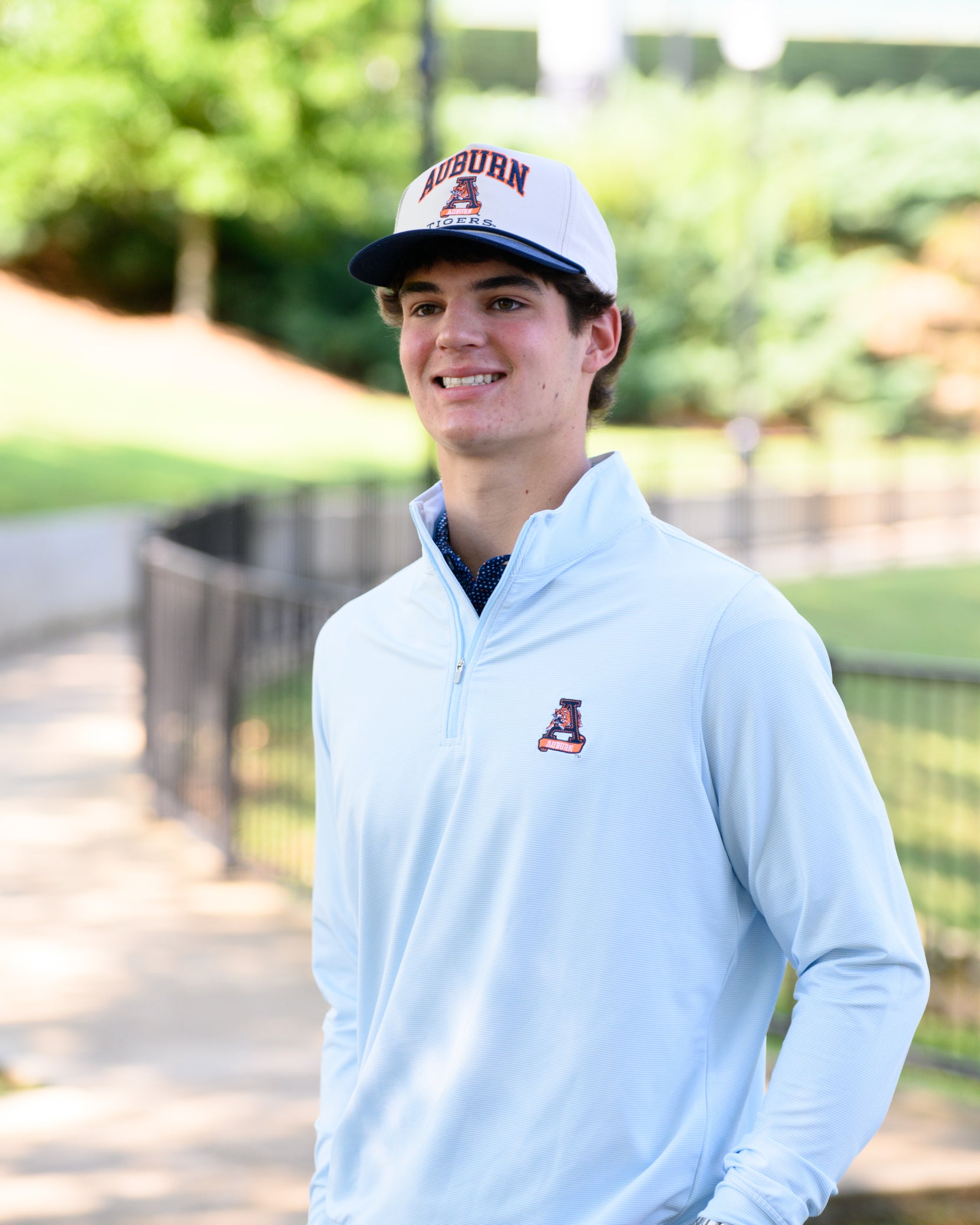 Auburn University Light Blue Men’s ¼ Zip with embroidery of Aubie leaping through an "A"