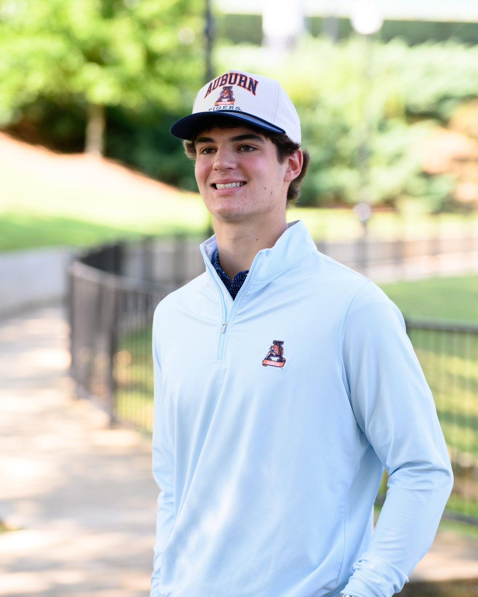 Auburn University Light Blue Men’s ¼ Zip with embroidery of Aubie leaping through an "A"