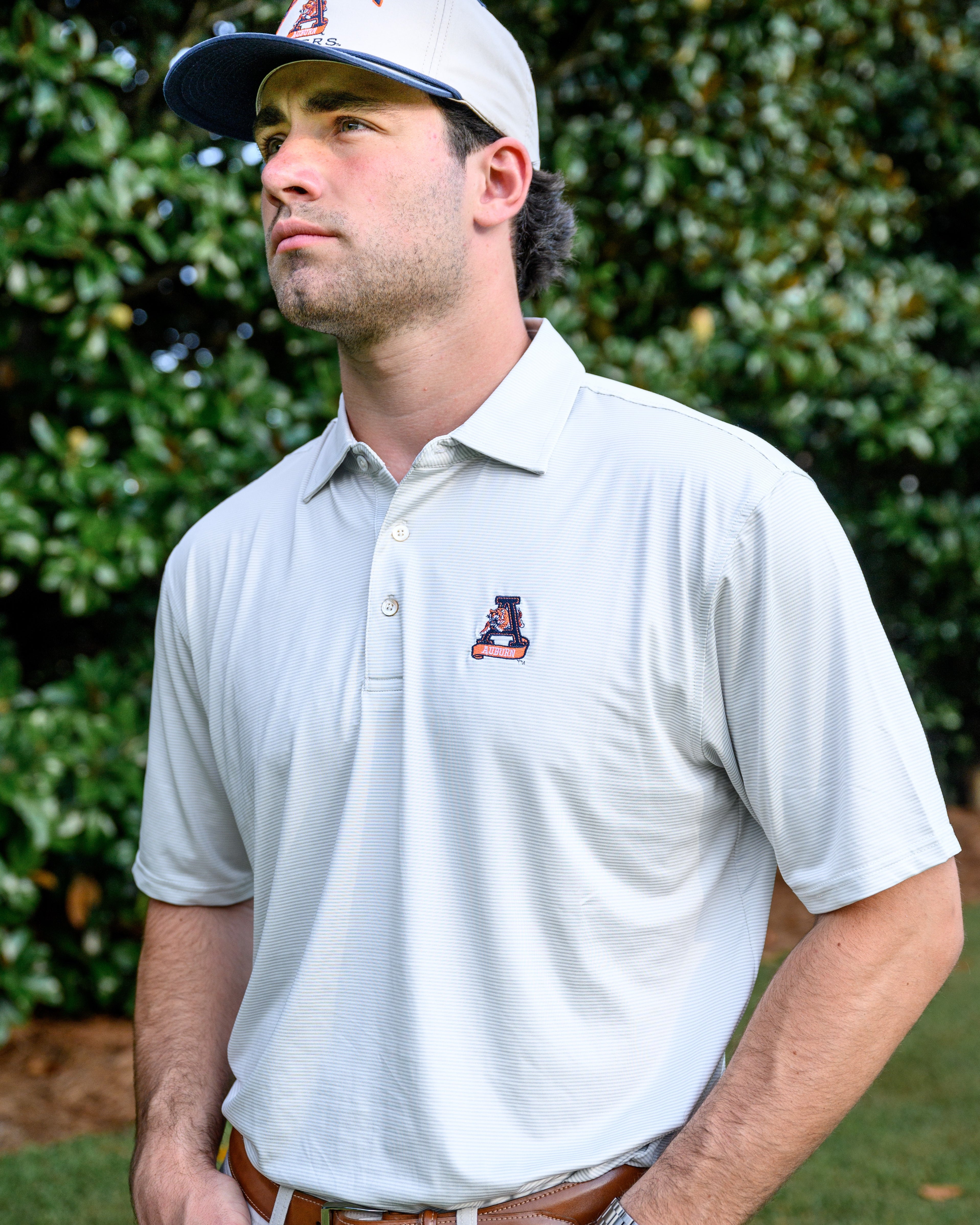 Auburn University Light Grey Men’s Polo with embroidery of Aubie leaping through an "A"