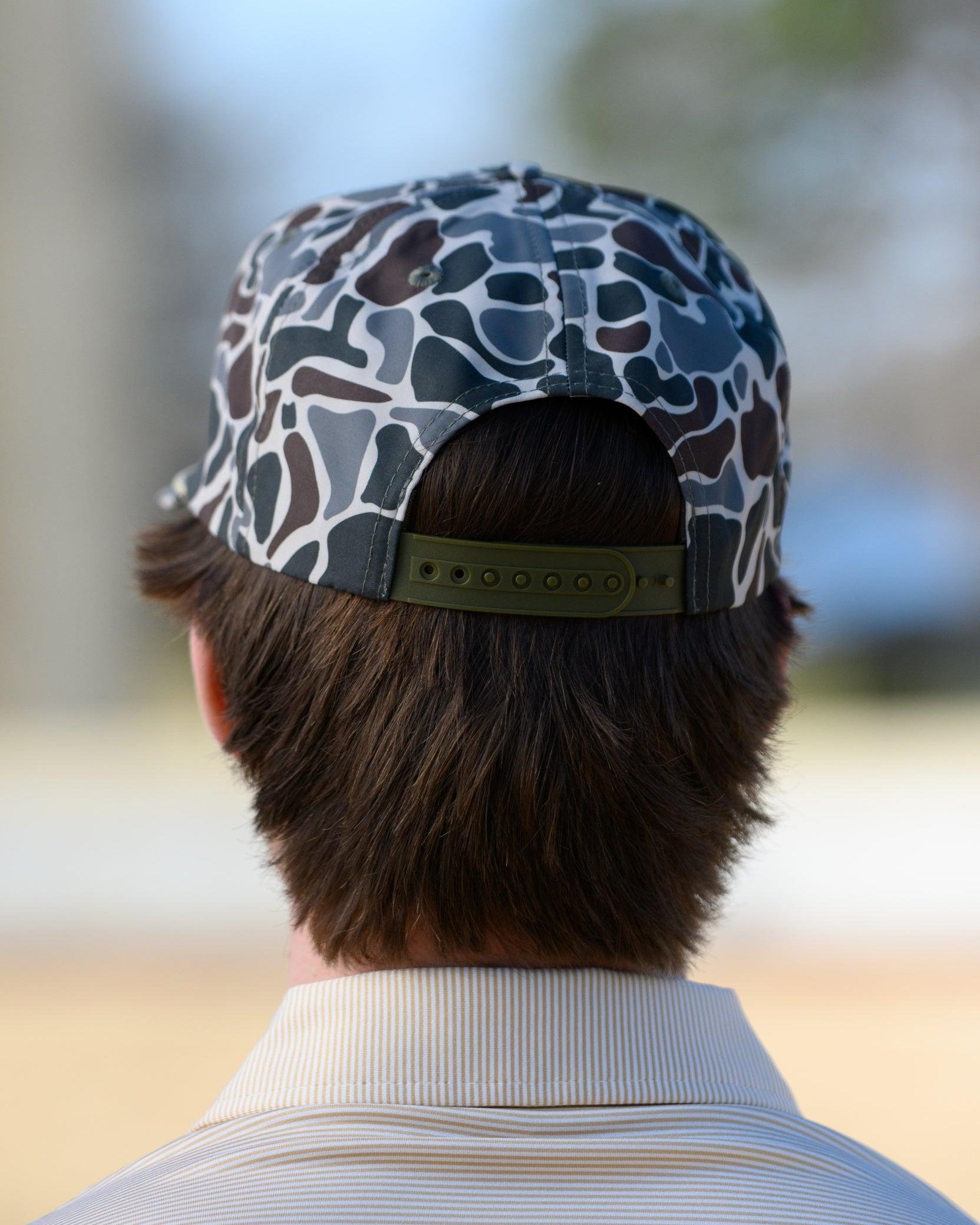 Mississippi State Camo Hat with a White rope and a leather patch with text “Mississippi State University”
snapback