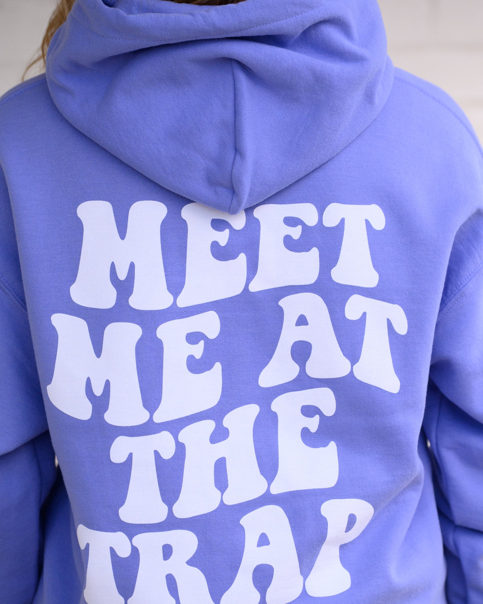Bear Trap Light Purple Hoodie with 'MEET ME AT THE TRAP' printed in white text on the back.