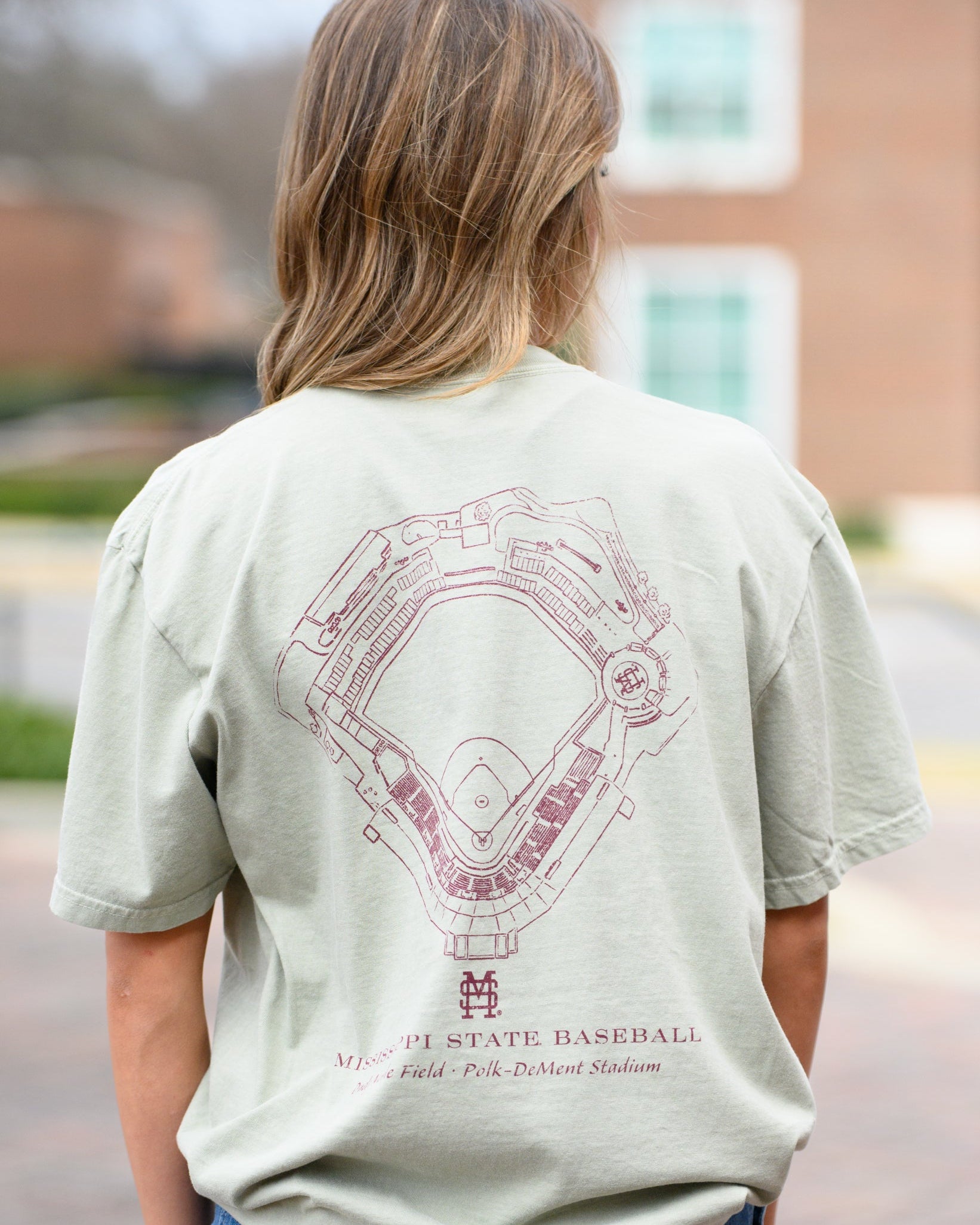 Mississippi State Sandstone Distressed Tee with a Maroon print of the Dudy-Noble Baseball Field blueprint above text “Mississippi Baseball”