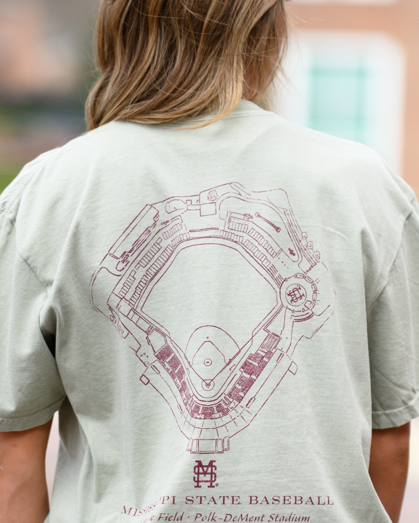 Mississippi State Sandstone Distressed Tee with a Maroon print of the Dudy-Noble Baseball Field blueprint above text “Mississippi Baseball”