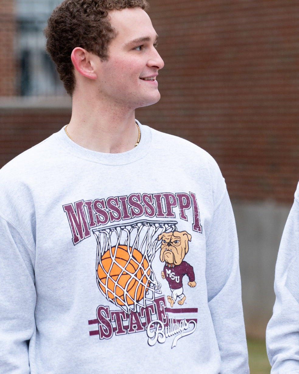Mississippi State Light Grey Heather Sweatshirt with a basketball landing in a hoop between text “Mississippi” and “State” and next to Bully