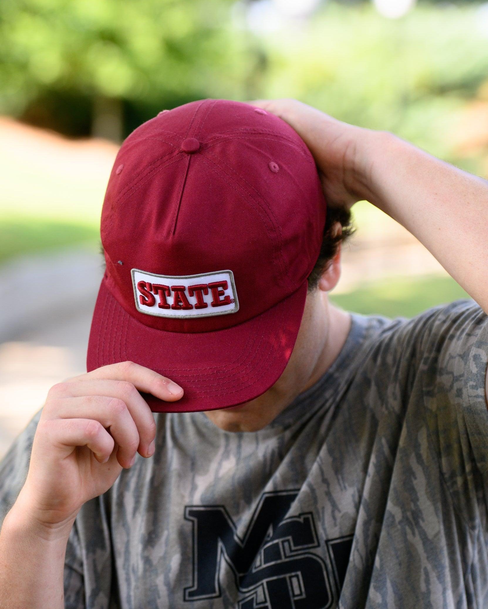 Mississippi State Maroon Snapback Hat featuring a White patch with Maroon “State” embroidery