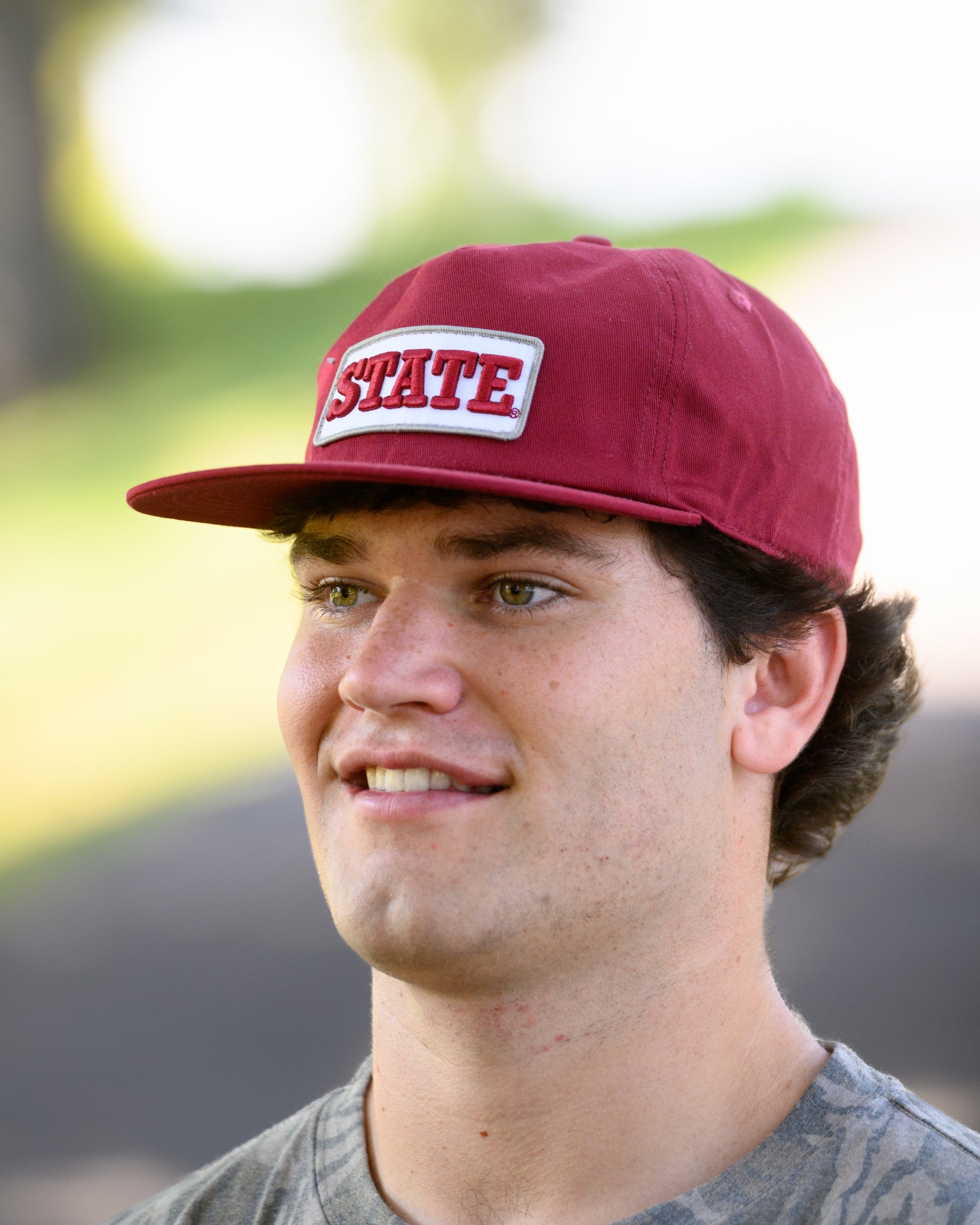 Mississippi State Maroon Snapback Hat featuring a White patch with Maroon “State” embroidery
