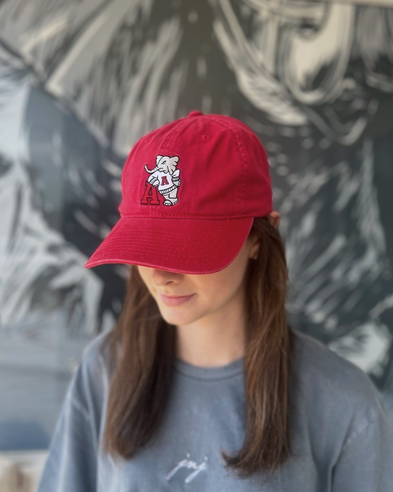University of Alabama Red Dad Hat with an embroidered Big Al leaning on a Red Block A