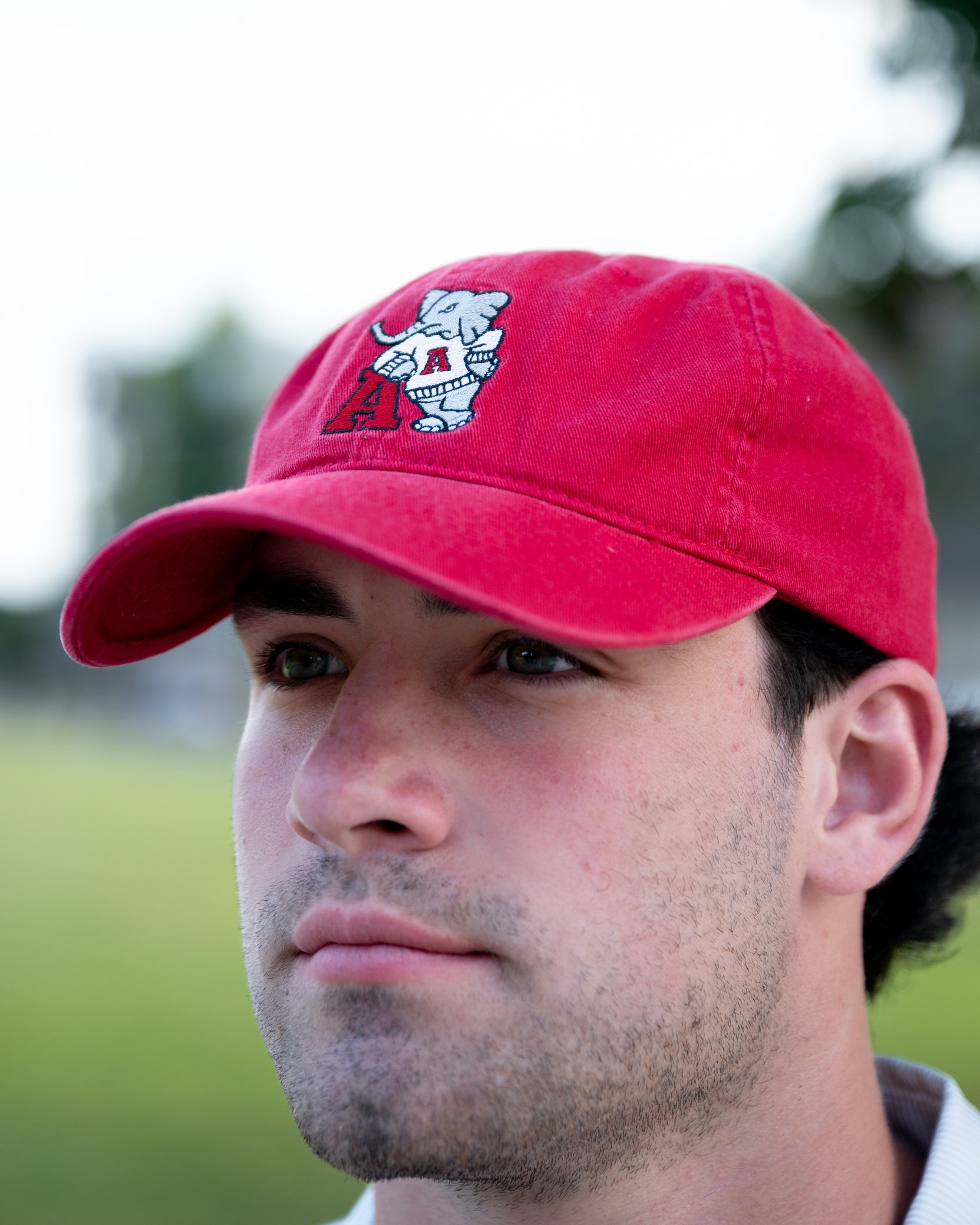 University of Alabama Red Dad Hat with an embroidered Big Al leaning on a Red Block A