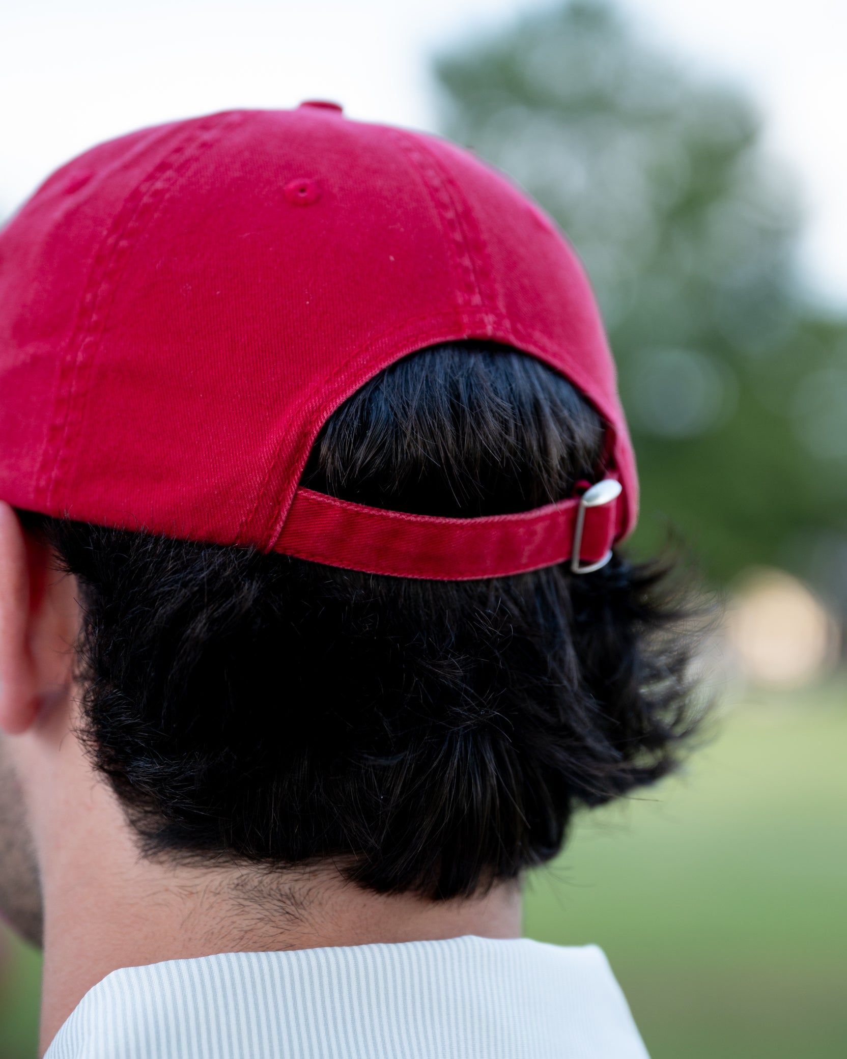 University of Alabama Red Dad Hat with an embroidered Big Al leaning on a Red Block A