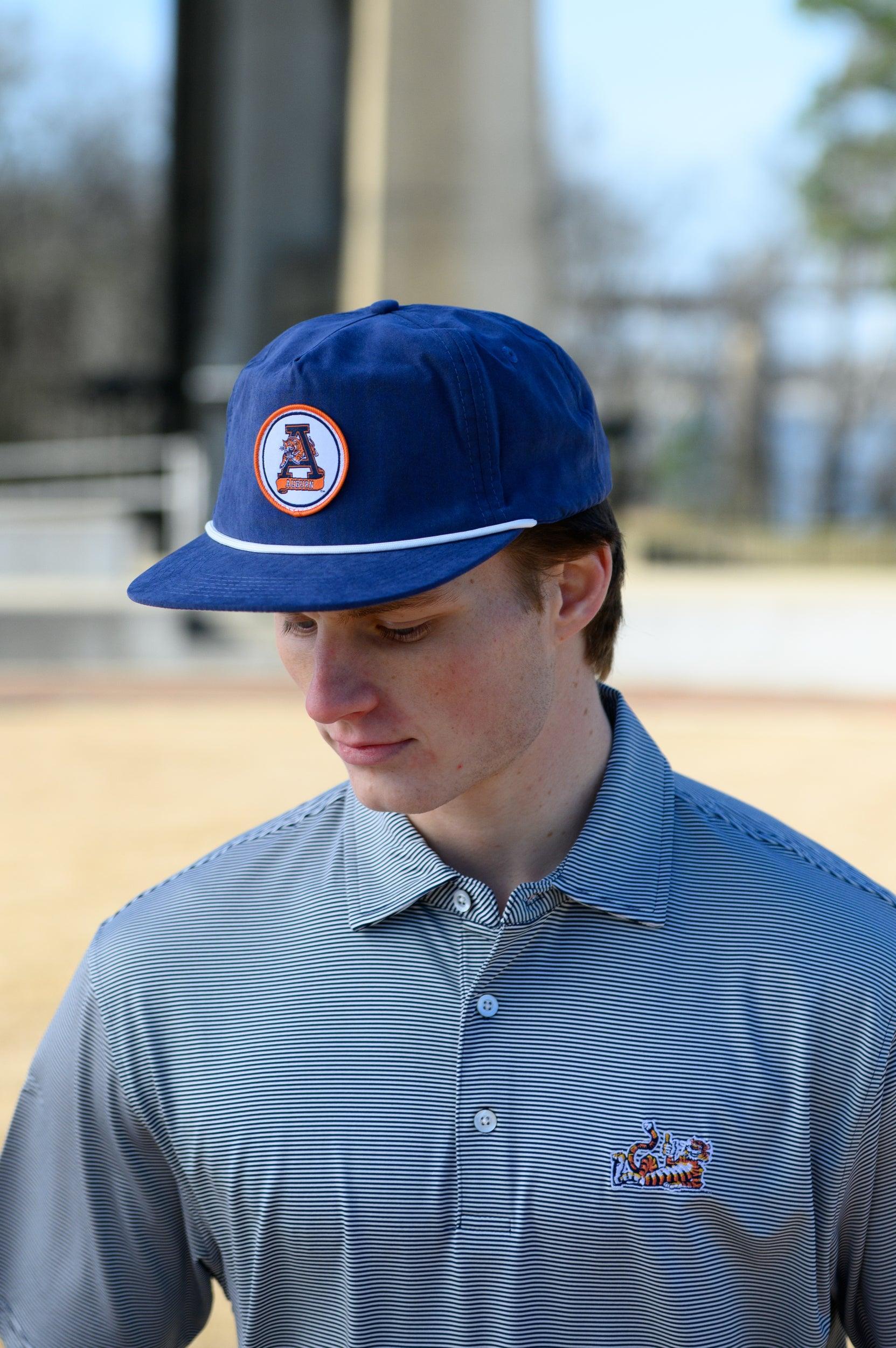 Auburn University Navy Hat with a White rope and a patch of the Leaping Tiger Logo