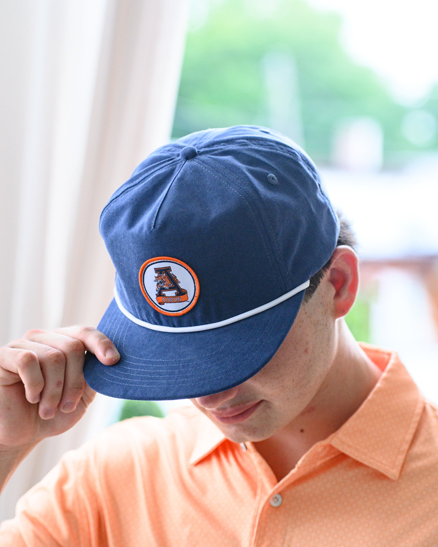 Auburn University Navy Hat with a White rope and a patch of the Leaping Tiger Logo
