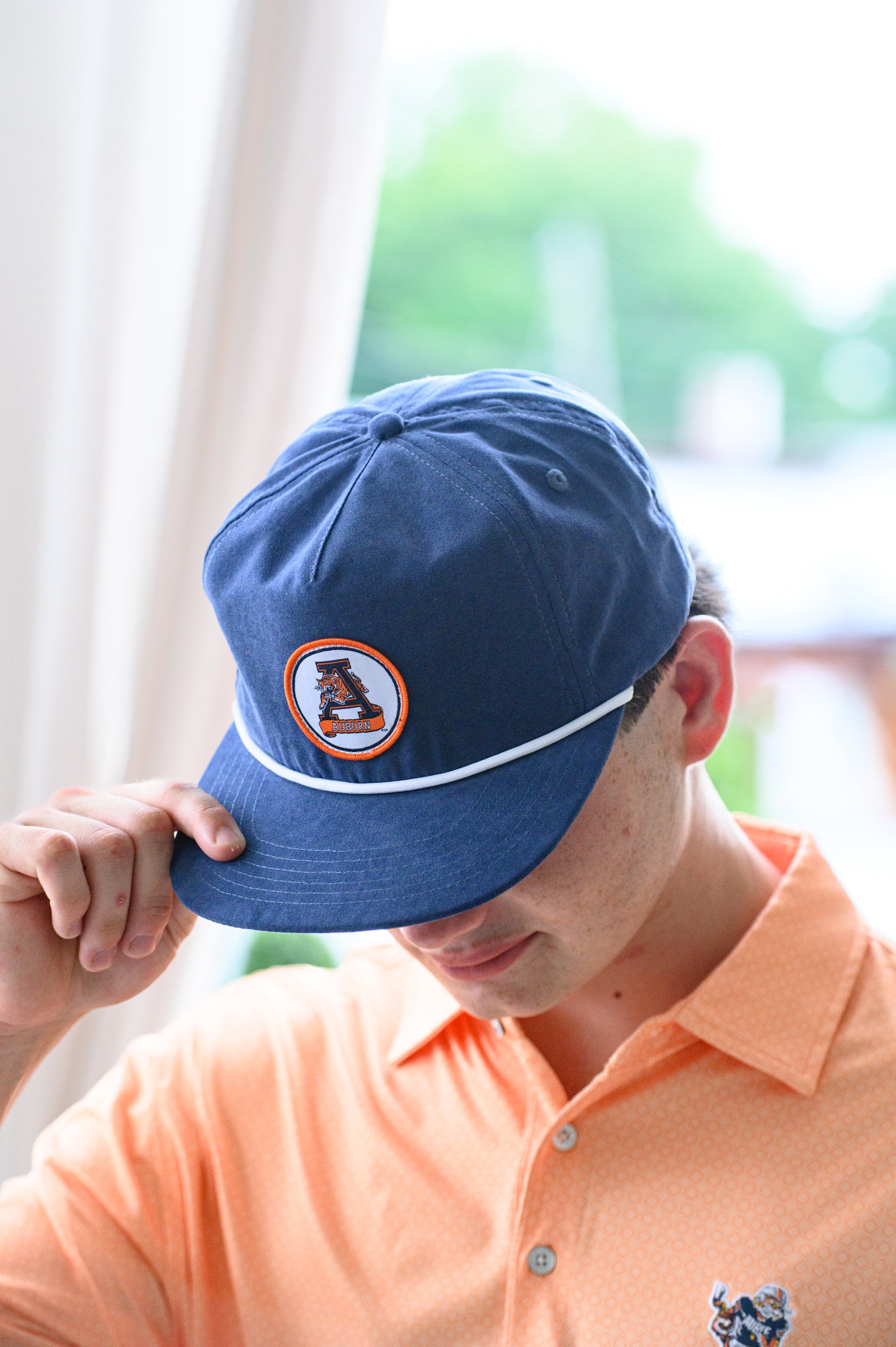 Auburn University Navy Hat with a White rope and a patch of the Leaping Tiger Logo