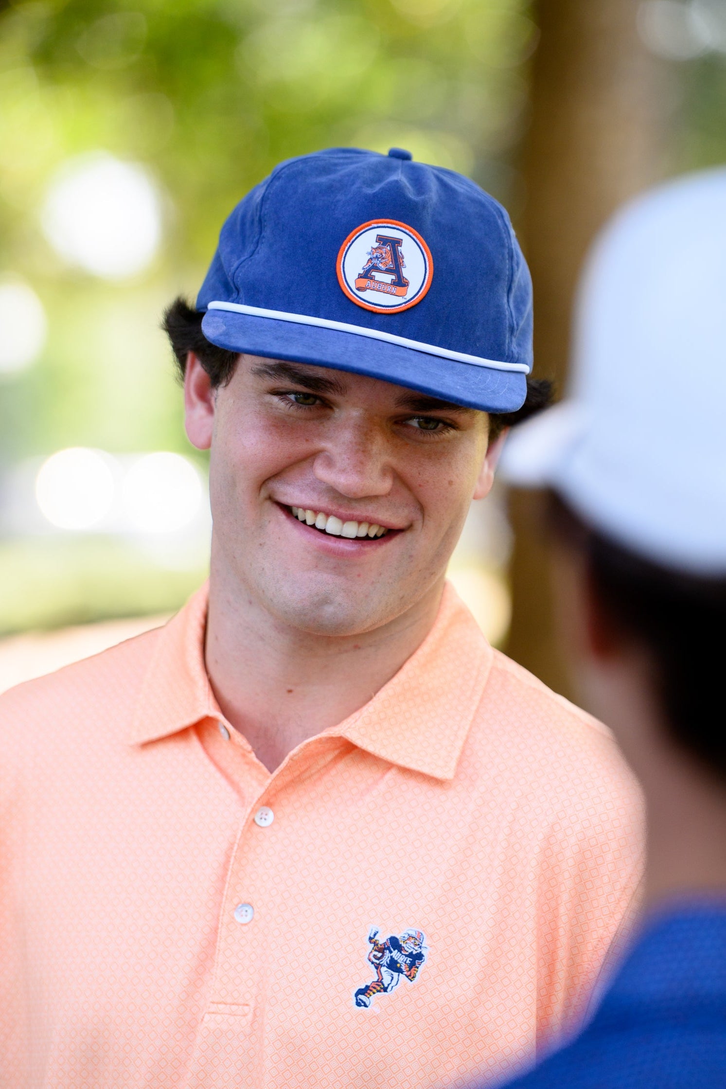Auburn University Navy Hat with a White rope and a patch of the Leaping Tiger Logo