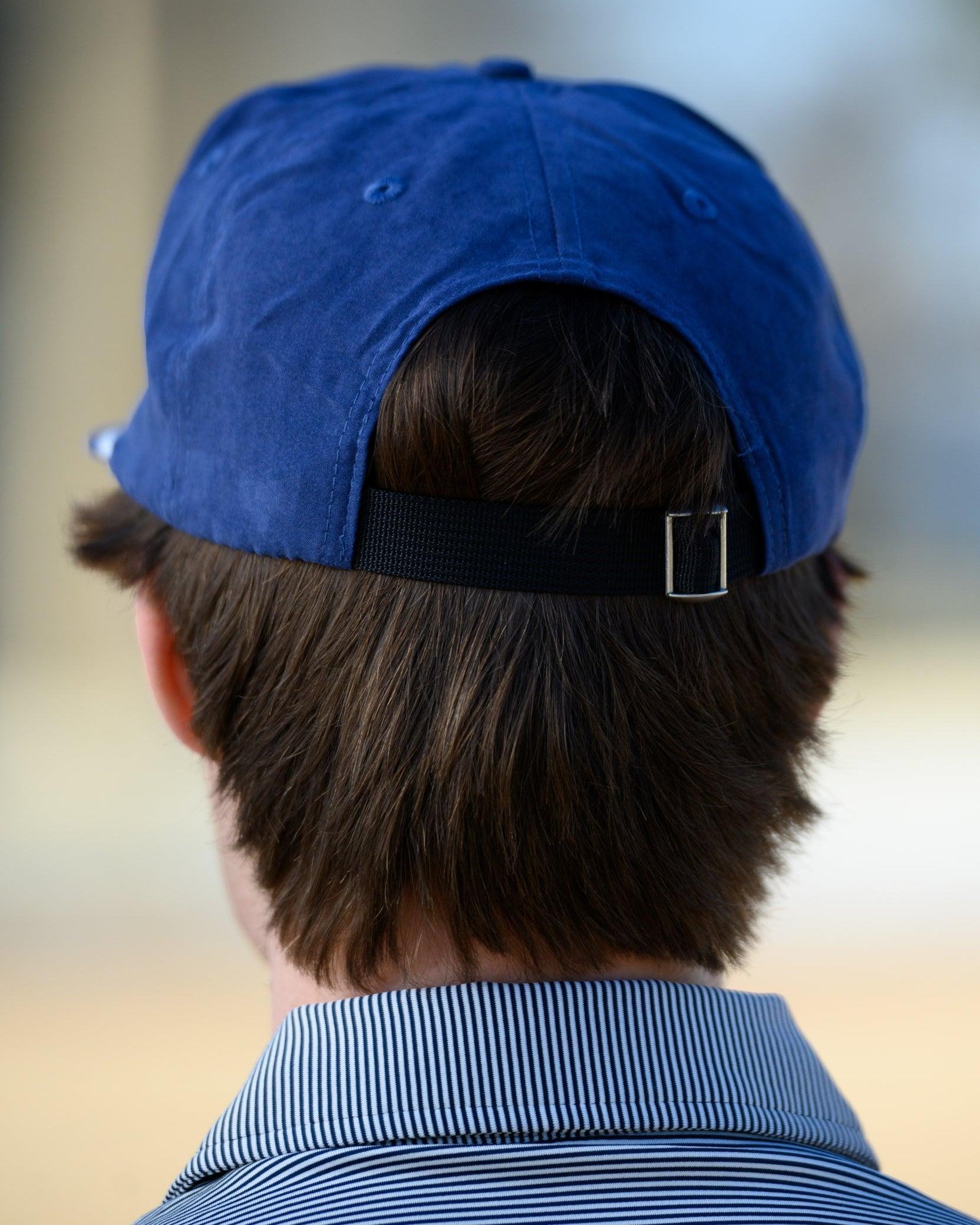 Auburn University Navy Hat with a White rope and a patch of the Leaping Tiger Logo.
Strap back
