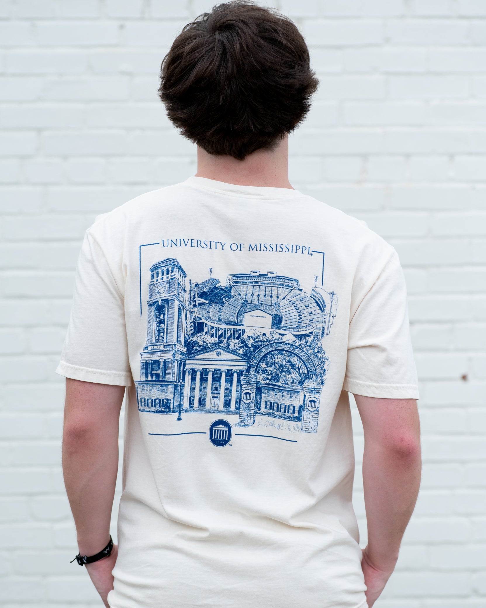 Ole Miss Ivory T-Shirt with an illustration of the campus’ most iconic landmarks