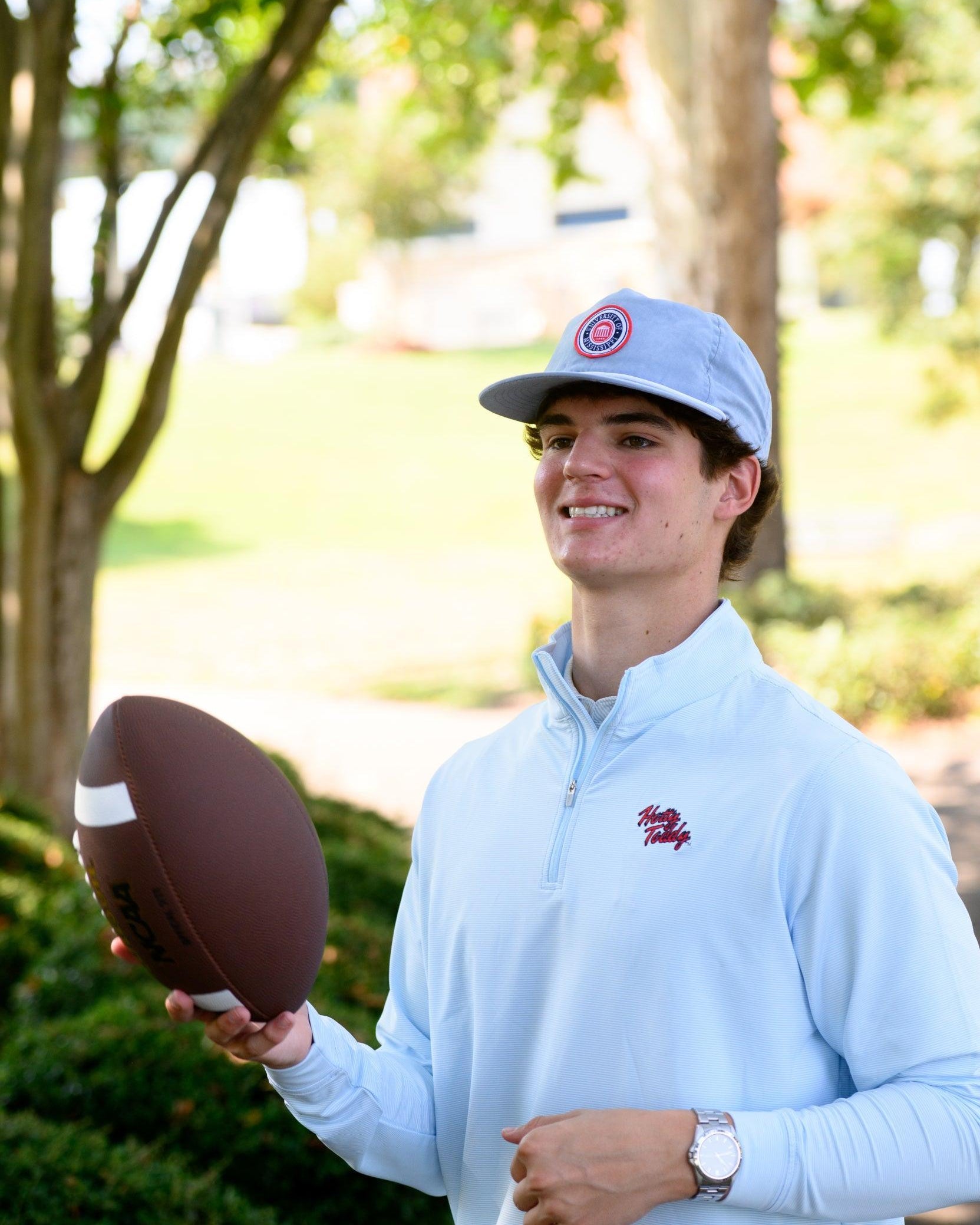 Ole Miss Dusty Blue Hat with a patch of the Ole Miss seal