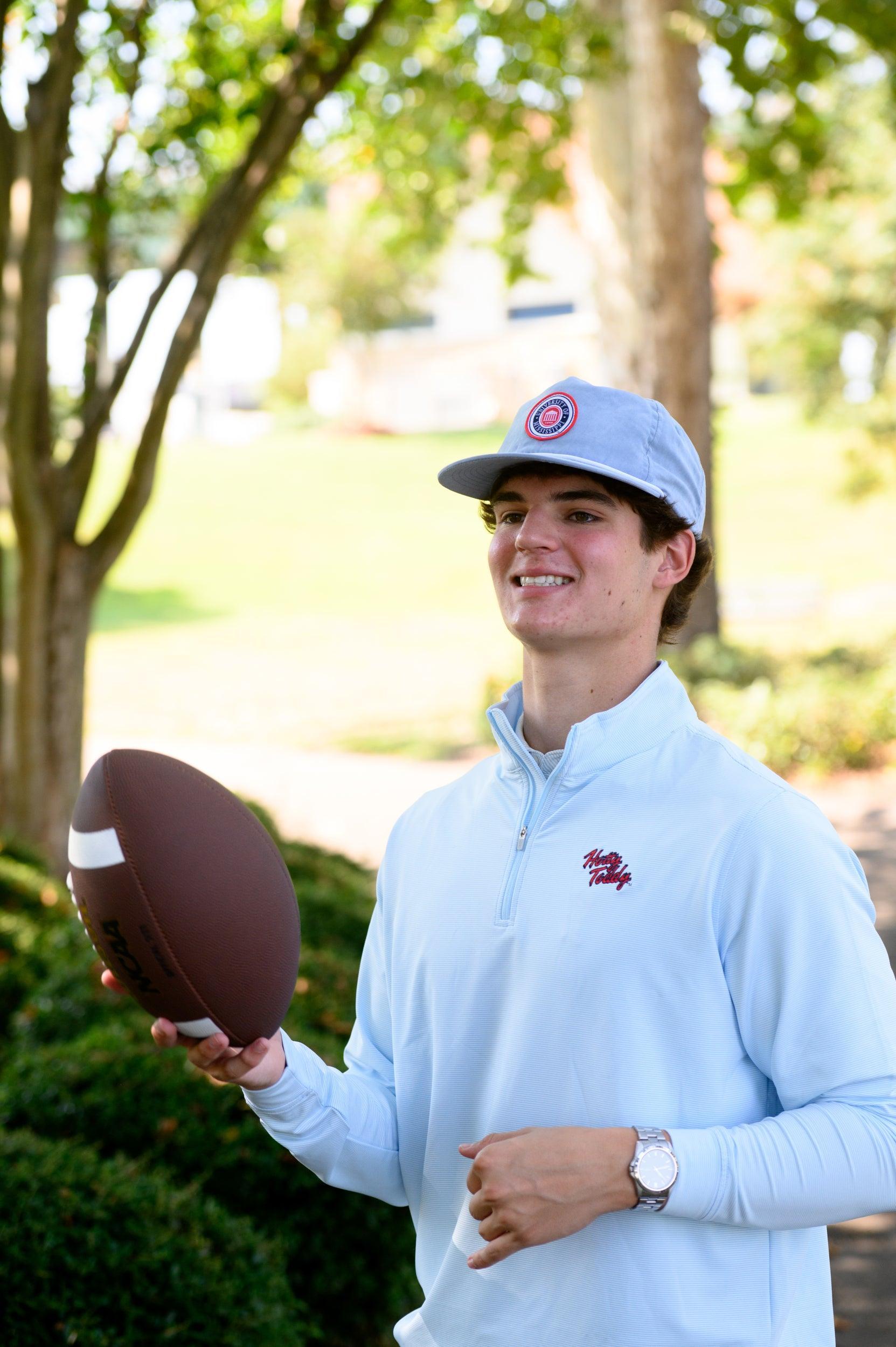 Ole Miss Dusty Blue Hat with a patch of the Ole Miss seal