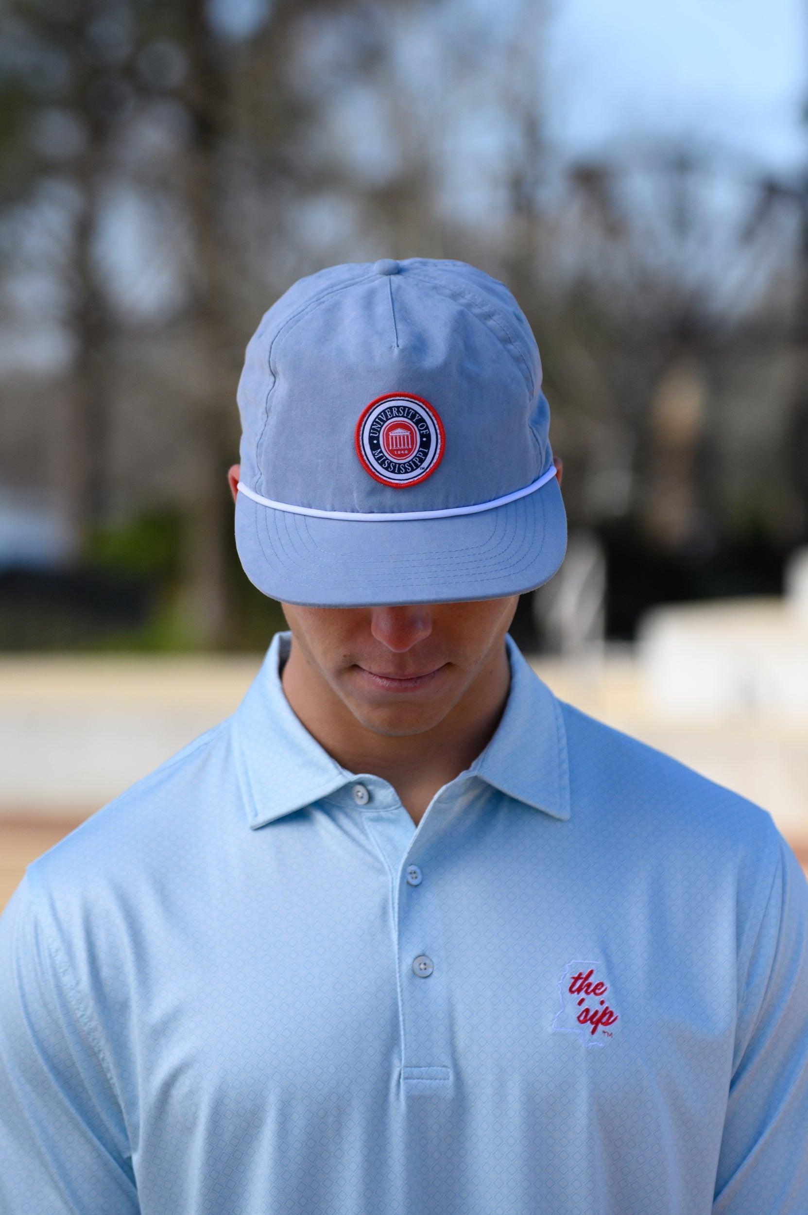 Ole Miss Dusty Blue Hat with a patch of the Ole Miss Seal
