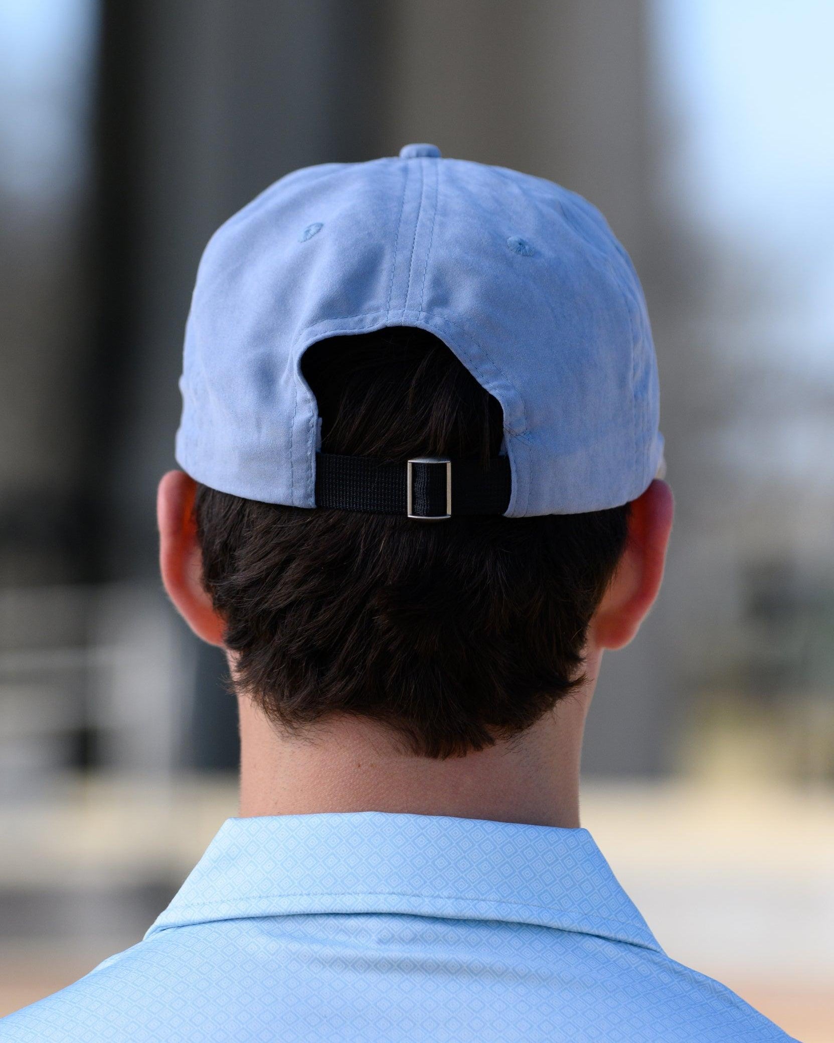 Ole Miss Dusty Blue Hat with a patch of the Ole Miss Seal
strap back