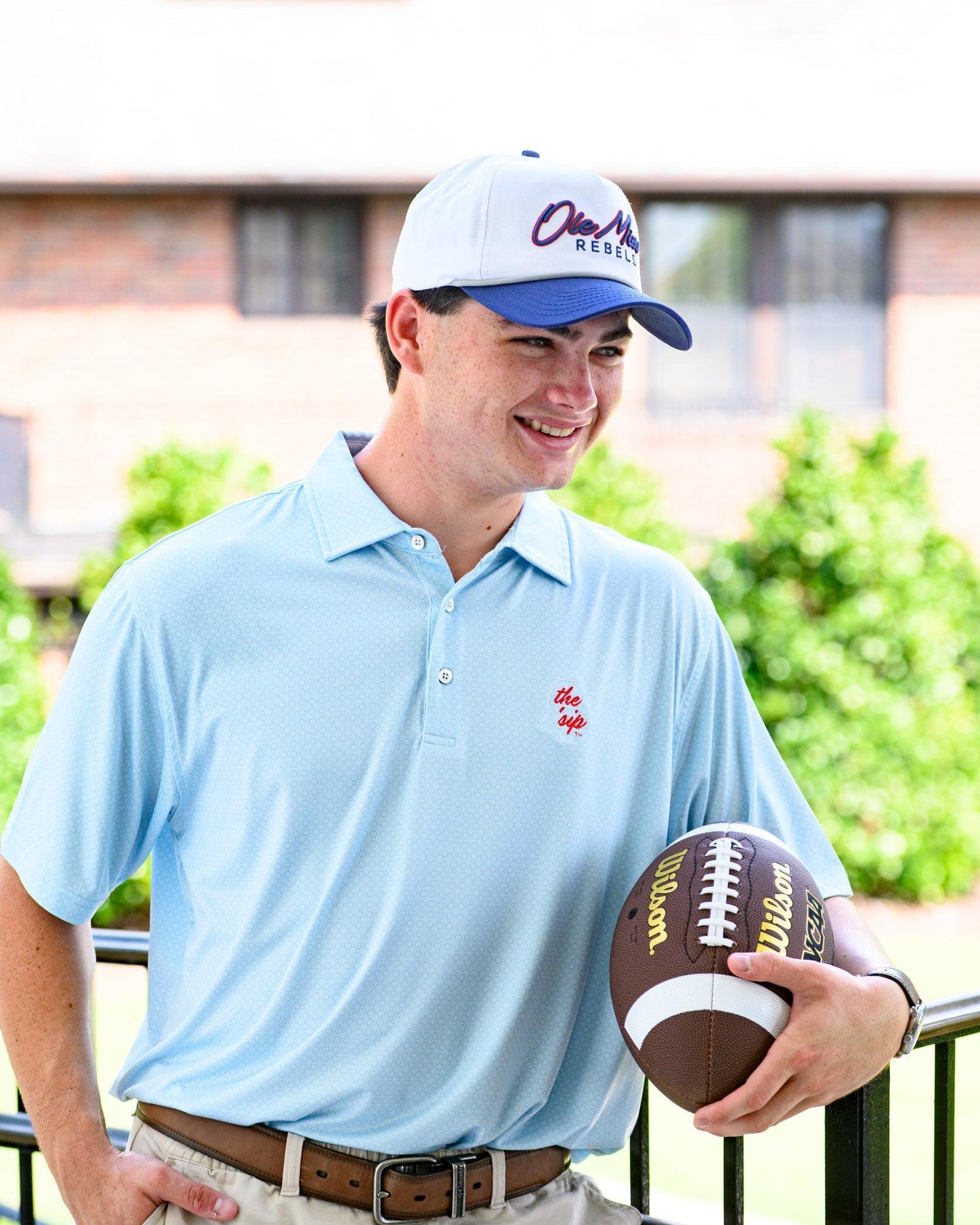 Ole Miss White and Navy Hat with Navy embroidery “Ole Miss” and Navy text “Rebels”