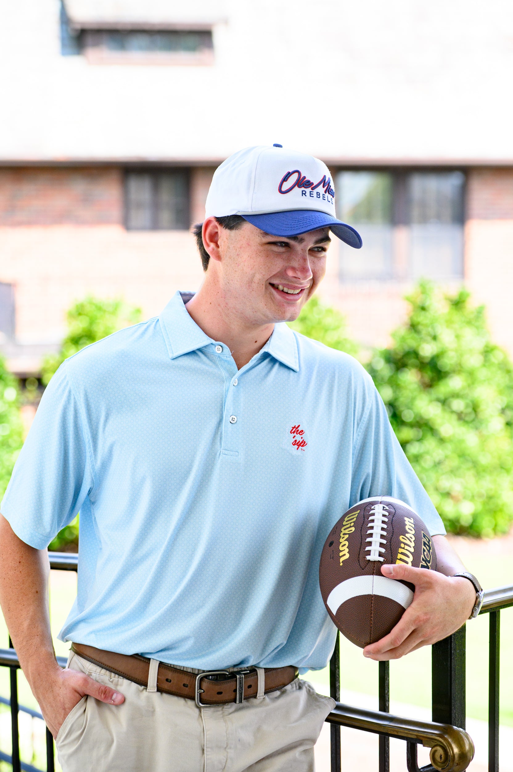 Ole Miss White and Navy Hat with Navy embroidery “Ole Miss” and Navy text “Rebels”