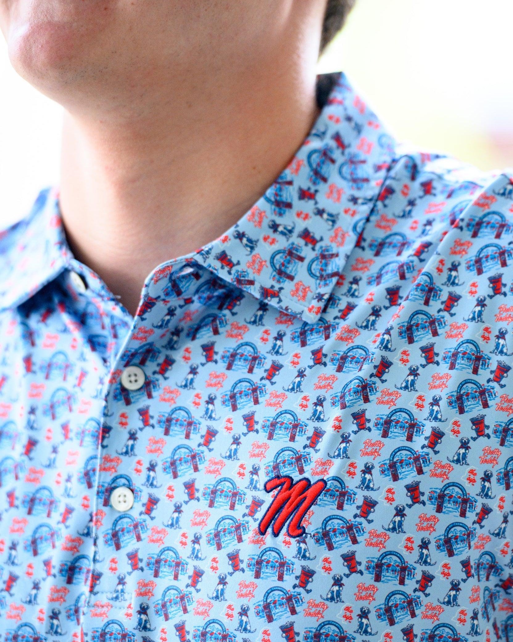 Ole Miss Blue Men’s Patterned Polo with the Script M Logo embroidery